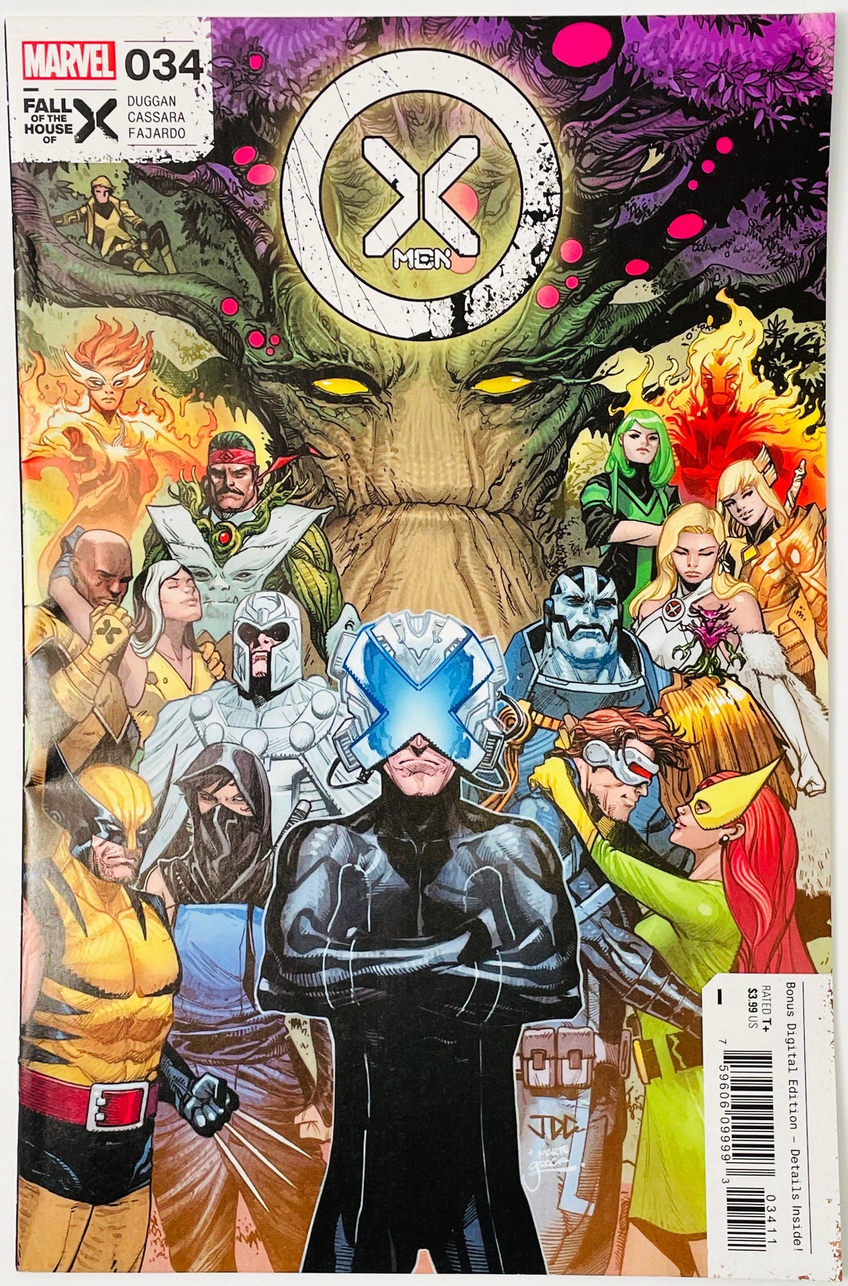 Marvel's X-Men Fall House #34 comic book cover featuring a large tree-like X-Men logo above a group of illustrated superhero characters including Cyclops, Wolverine, and others, with a barcode and issue label visible.