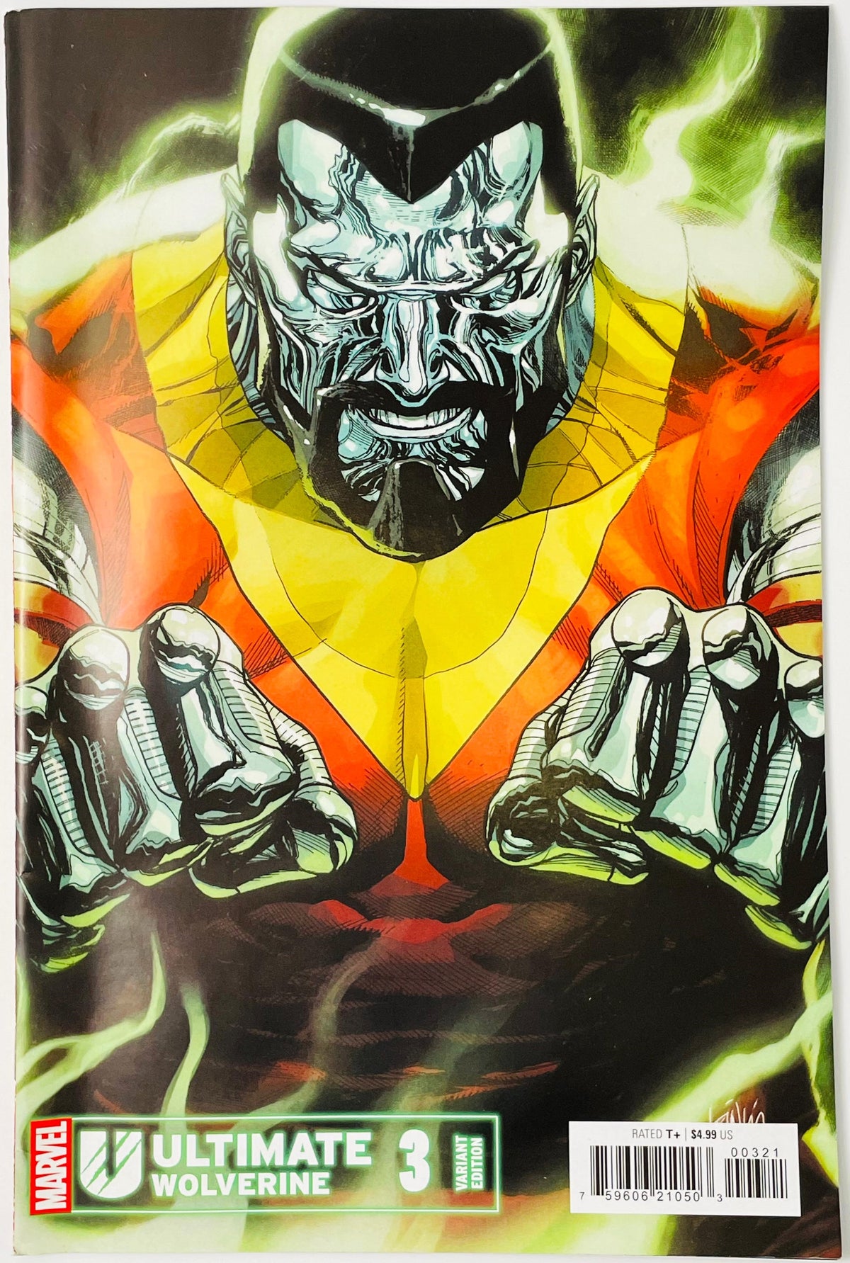 Marvel's Ultimate Wolverine #3 comic book cover featuring a close-up illustration of Wolverine with glowing green energy around him and a yellow and red costume. The Marvel logo and issue number 3 are visible at the bottom.