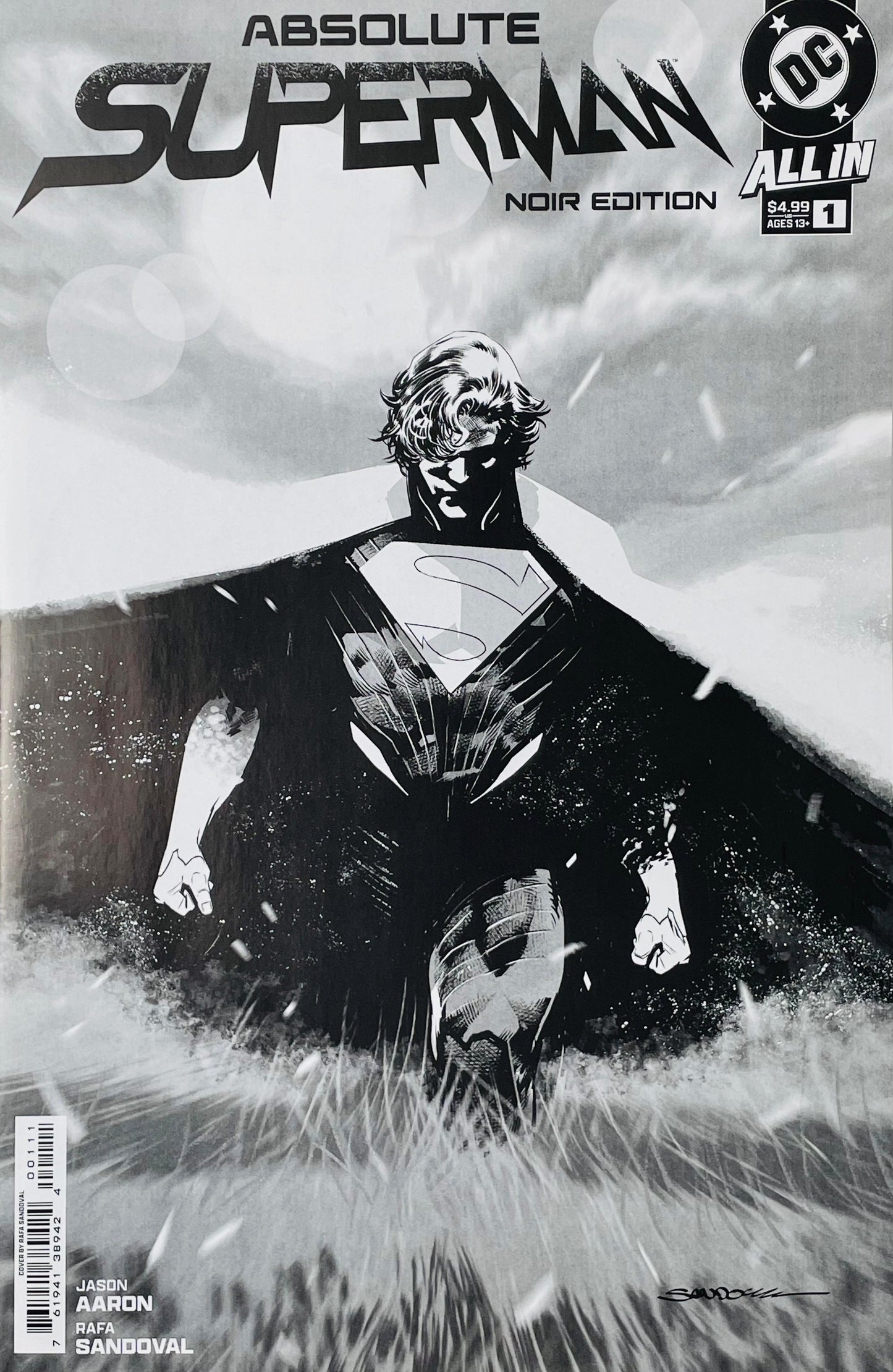 Absolute Superman issue 1 Noir Edition black and white cover showing Superman walking through tall grass with a wide cape spreading out behind him.