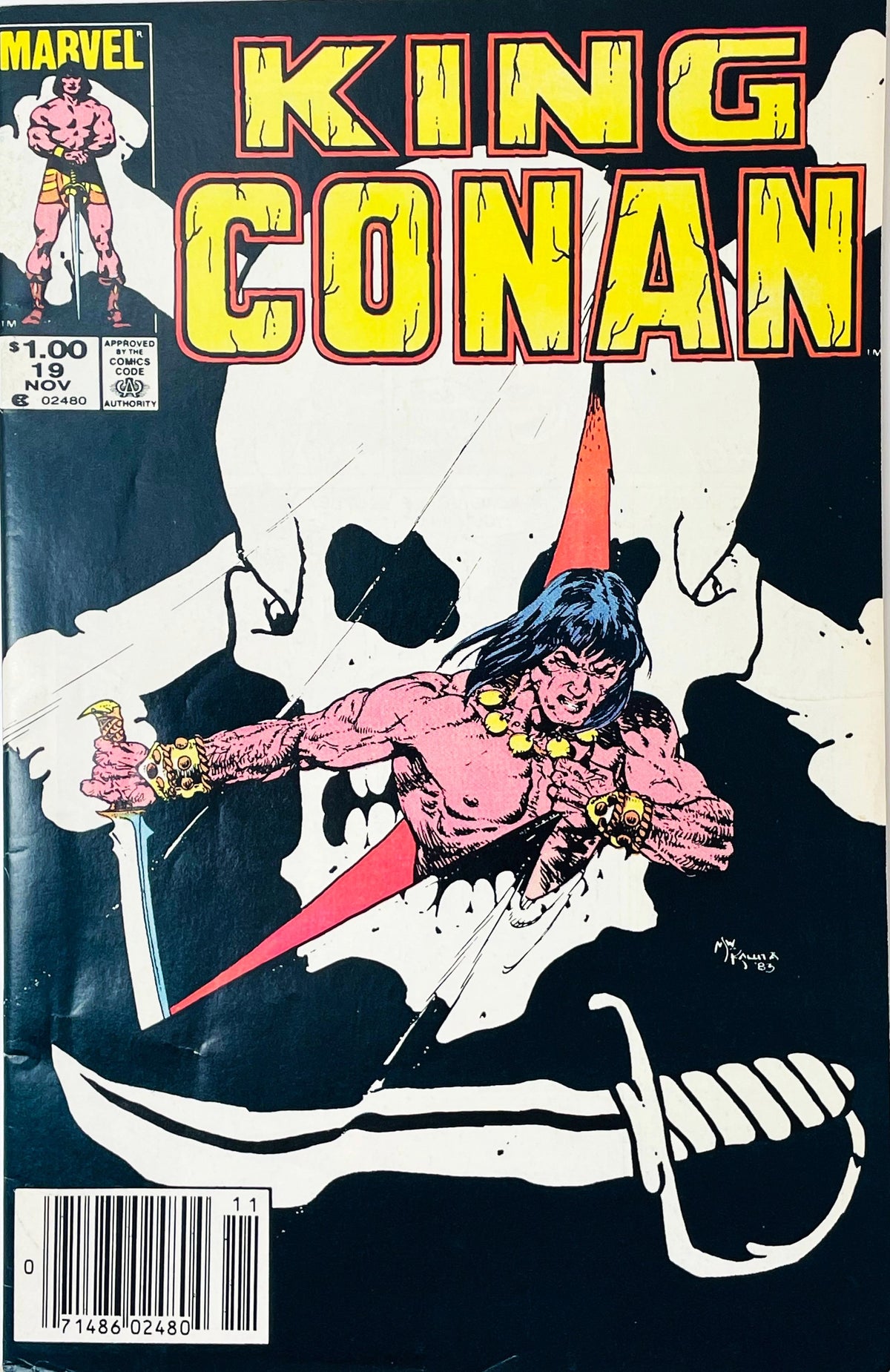 King Conan issue 19 comic book published by Marvel Comics featuring Michael Kaluta cover art of Conan bursting through a slash in front of a giant white skull and cutlass.