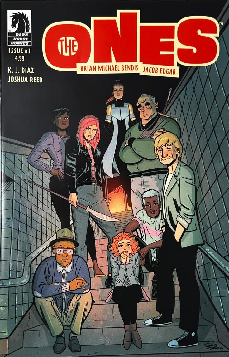 The Ones issue 1 comic book published by Dark Horse Comics featuring Jacob Edgar cover art of a team of diverse chosen ones standing on subway stairs.