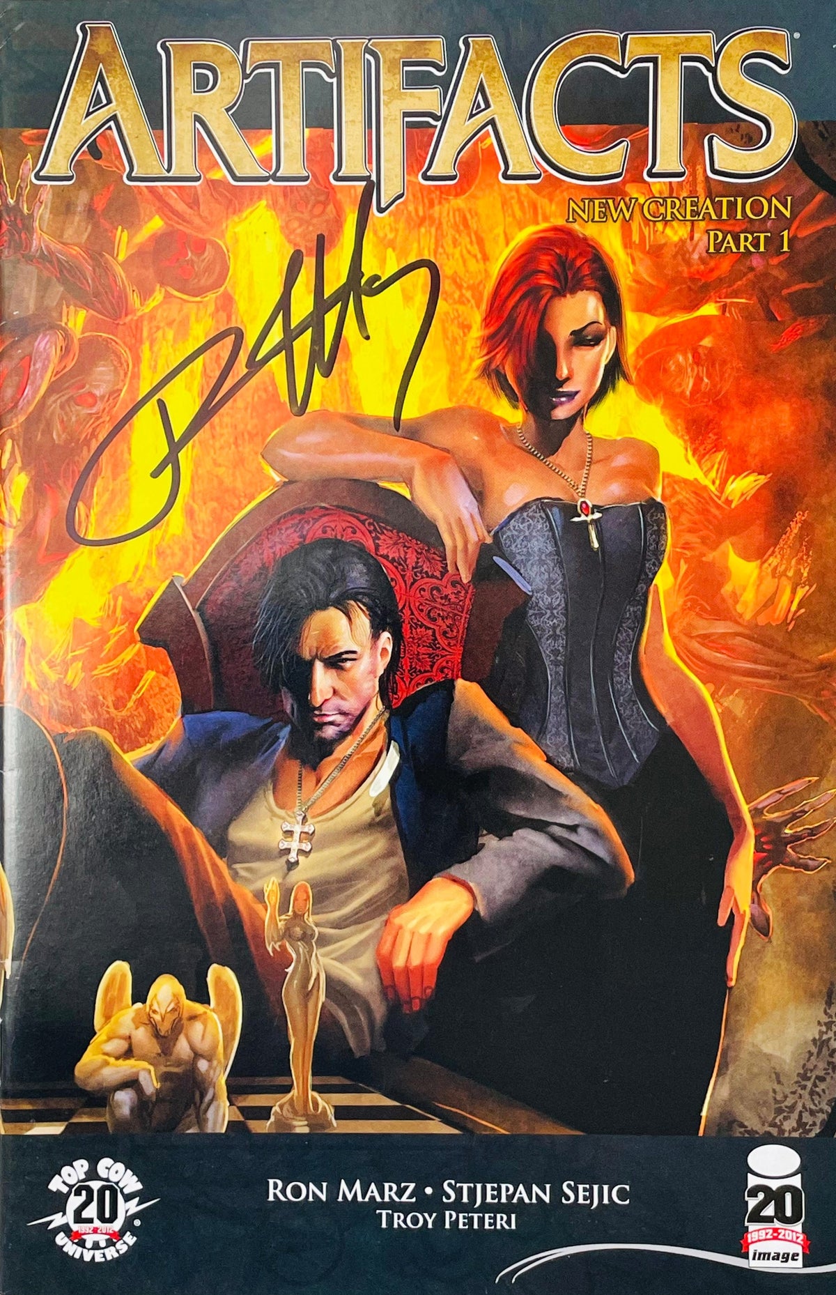 Artifacts issue 14 signed comic book published by Top Cow Image Comics featuring Jackie Estacado and Sara Pezzini painted cover art by Stjepan Sejic with black signature.