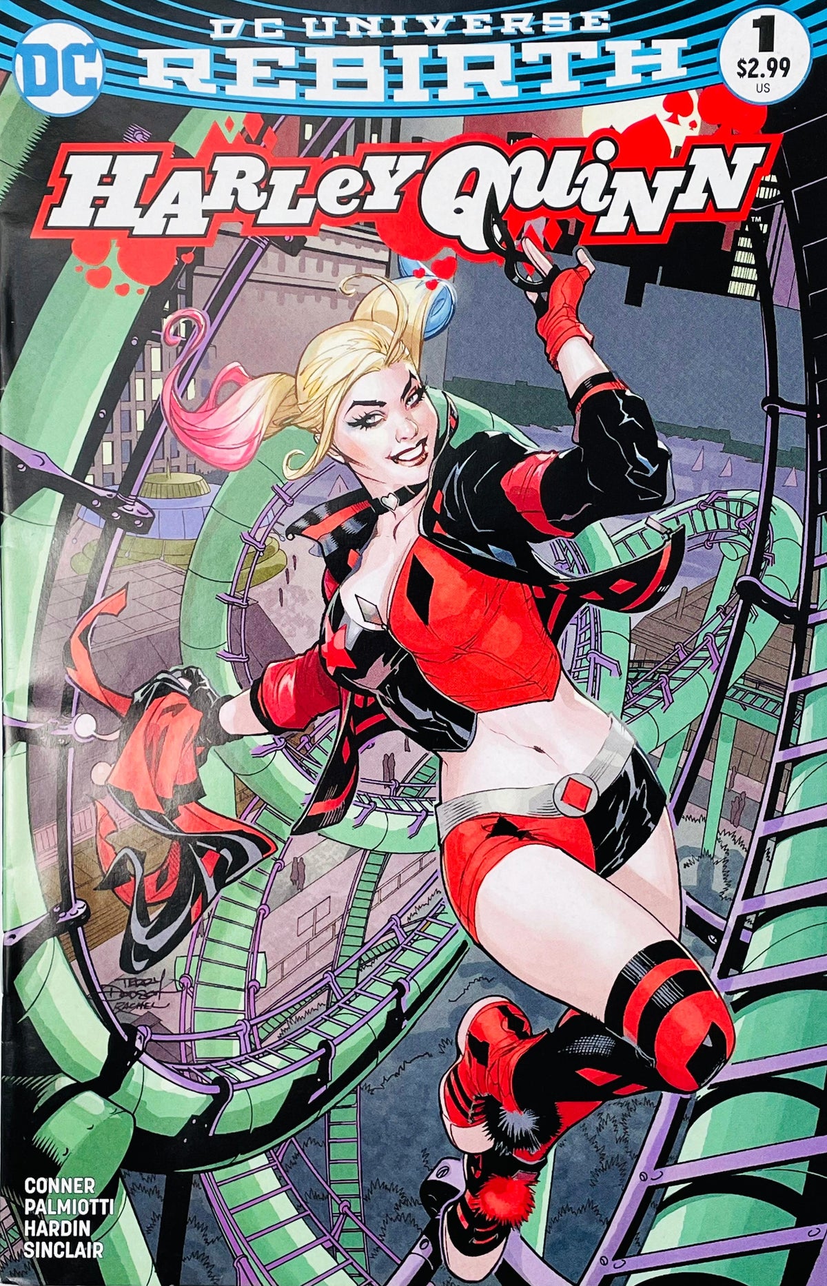 Harley Quinn issue 1 DC Rebirth comic book published by DC Comics featuring Harley Quinn swinging on a Coney Island roller coaster cover art by Amanda Conner.
