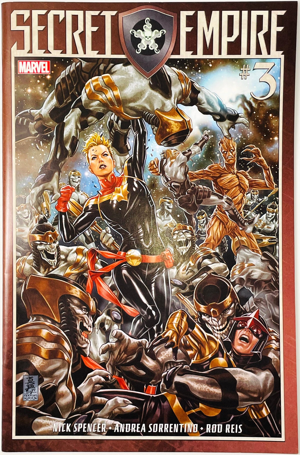 Marvel's Secret Empire #3 comic book cover featuring a dynamic, highly detailed illustration of multiple superheroes and villains in an action scene, framed by a reddish-brown border.