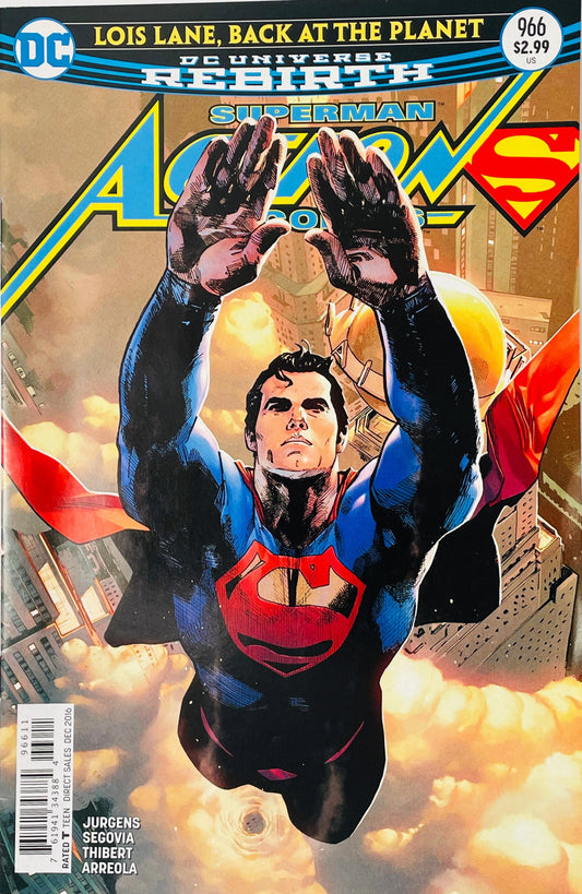 Action Comics #966 Gary Frank and Brad Anderson variant comic book cover featuring Superman flying upward with both arms raised, his red cape flowing behind him, while Superwoman appears behind him in a white and red costume above a city skyline surrounded by glowing clouds and golden light, beneath the large Action Comics logo and DC Universe Rebirth branding.