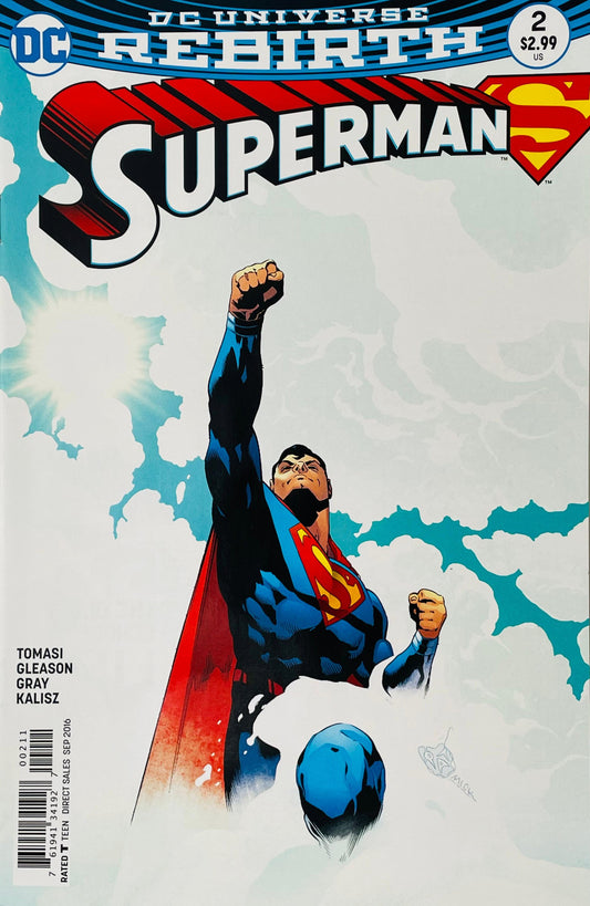 Superman issue 2 variant cover by Kenneth Rocafort featuring Superman soaring upward toward the sun with a raised fist into a bright blue sky.