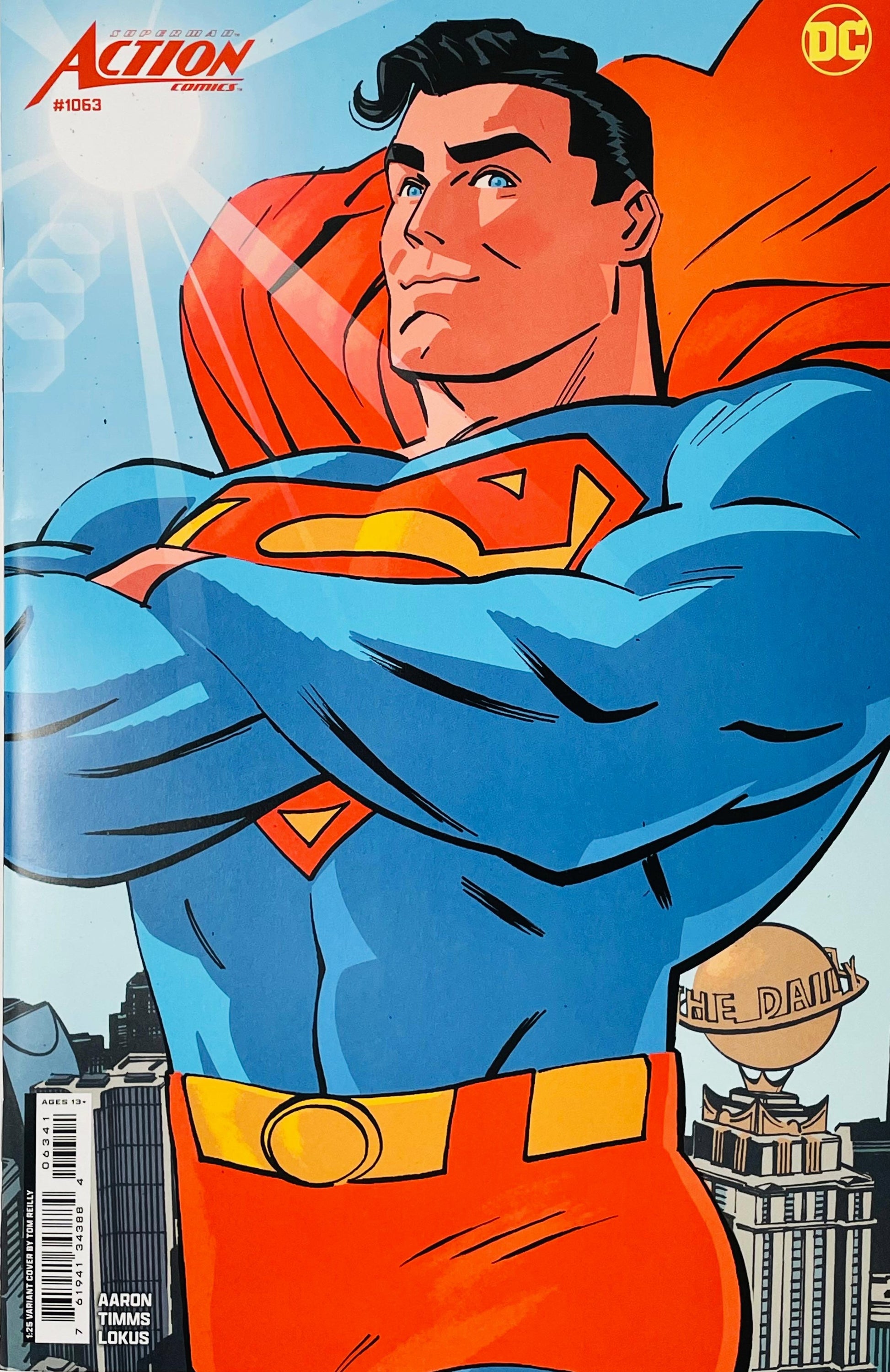 Action Comics issue 1063 1:25 variant cover by Tom Reilly depicting Superman smiling with crossed arms high above Metropolis and the Daily Planet.