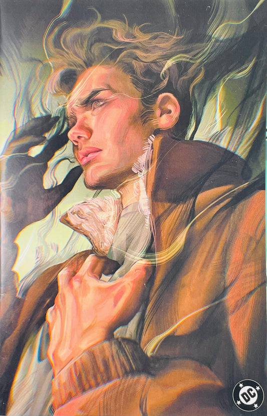 John Constantine Hellblazer issue 1 virgin variant cover by Tula Lotay featuring a painterly portrait of John Constantine clutching his trench coat in mystical smoke.