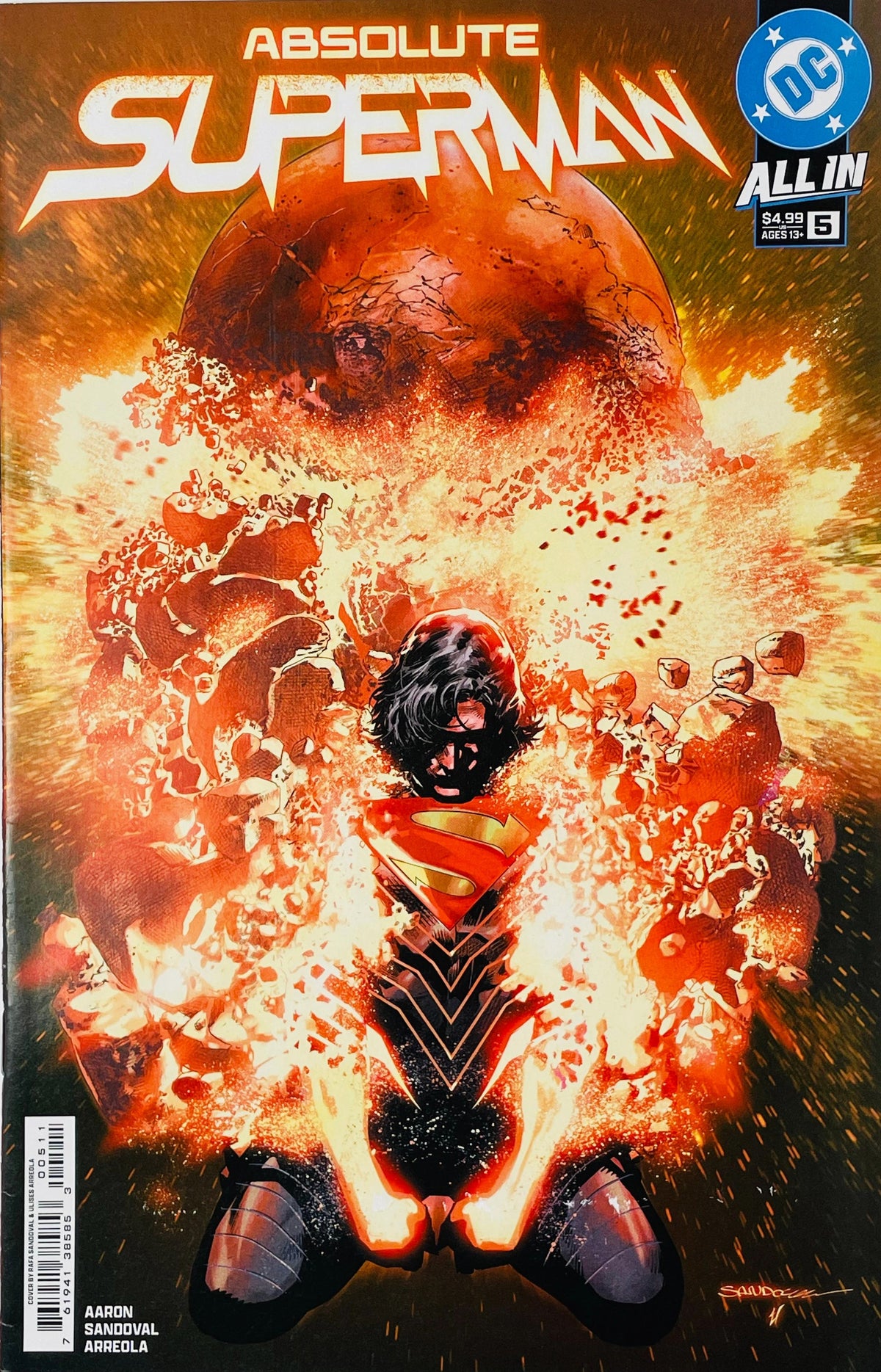 Absolute Superman issue 5 cover showing Superman kneeling with glowing hands as a planet explodes in fiery debris behind him.