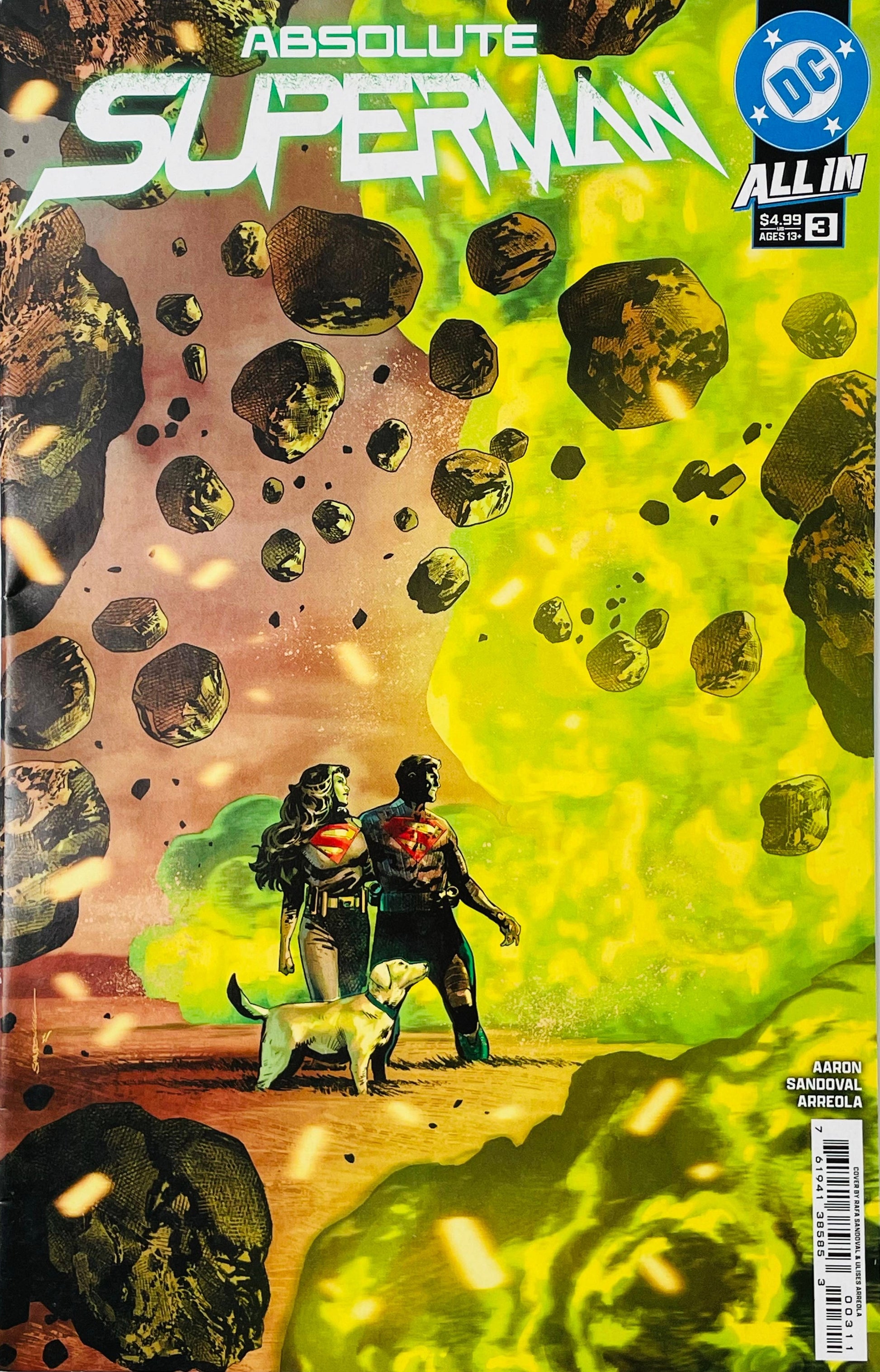Absolute Superman issue 3 cover showing Superman, Supergirl, and Krypto standing on a desolate landscape as green meteorites and rocks rain down from above.
