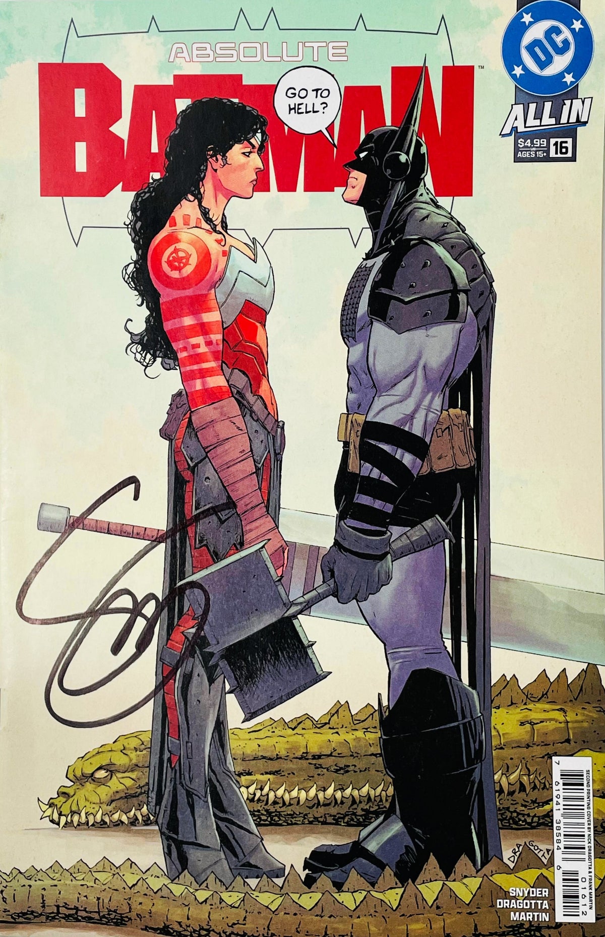 Signed Absolute Batman issue 16 cover by Nick Dragotta featuring Absolute Wonder Woman with a broadsword facing off against Absolute Batman with a black signature.