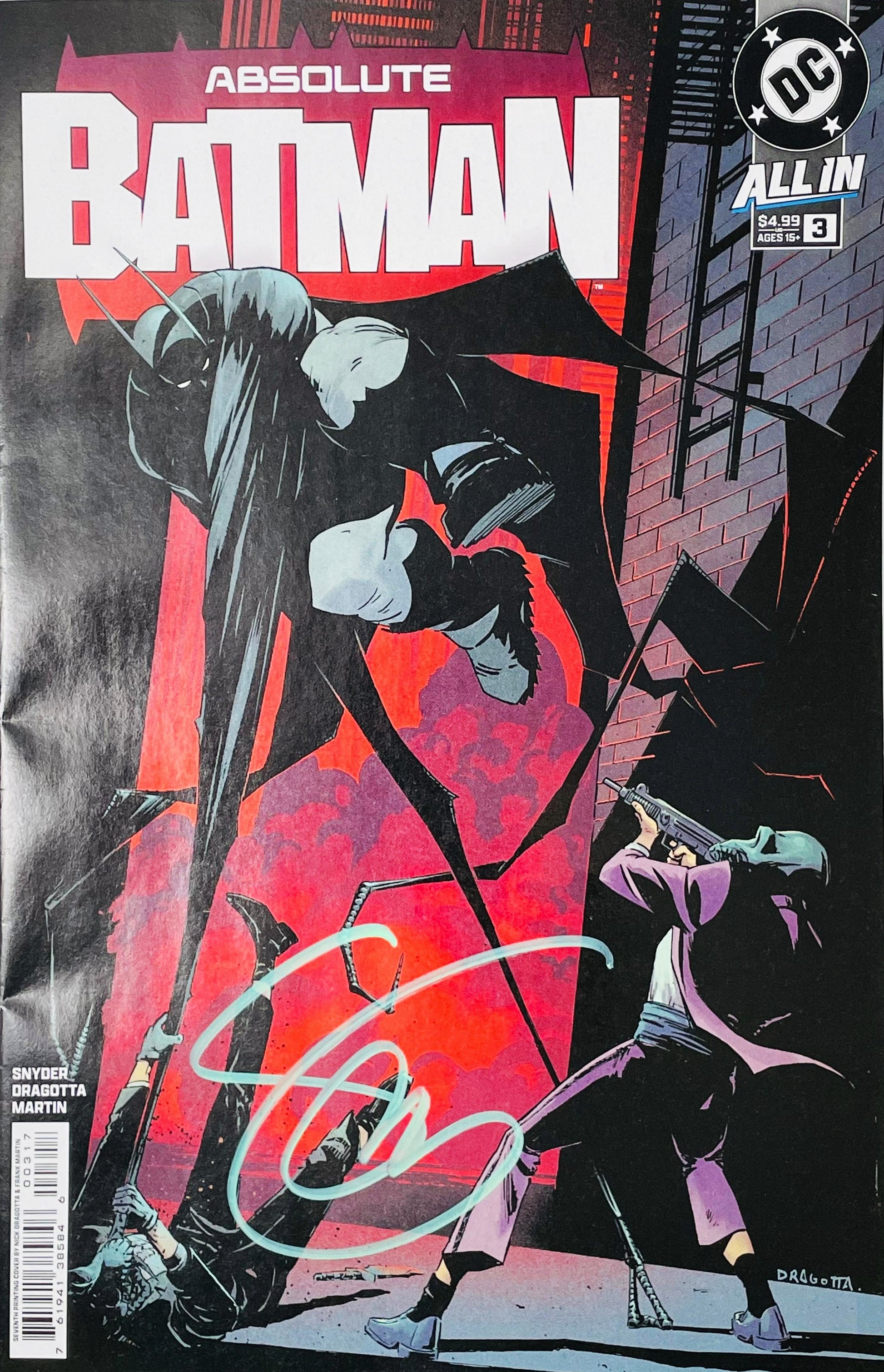 Signed Absolute Batman issue 3 main cover by Nick Dragotta showing Batman diving down an alleyway toward armed enemies with a blue signature across the bottom.