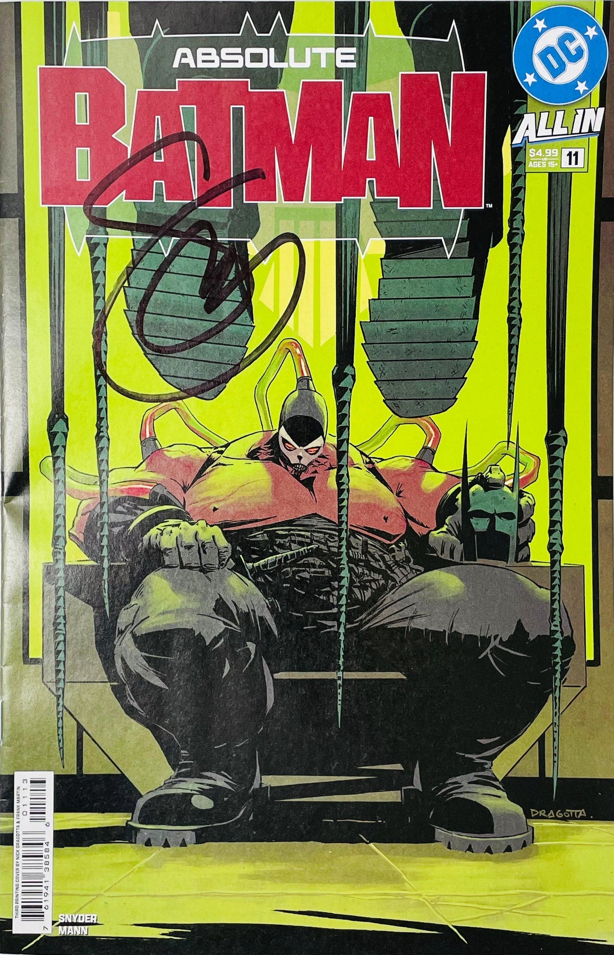Signed Absolute Batman issue 11 cover by Nick Dragotta showing Bane enthroned holding Batman cowl under boots with a signature across the title logo.