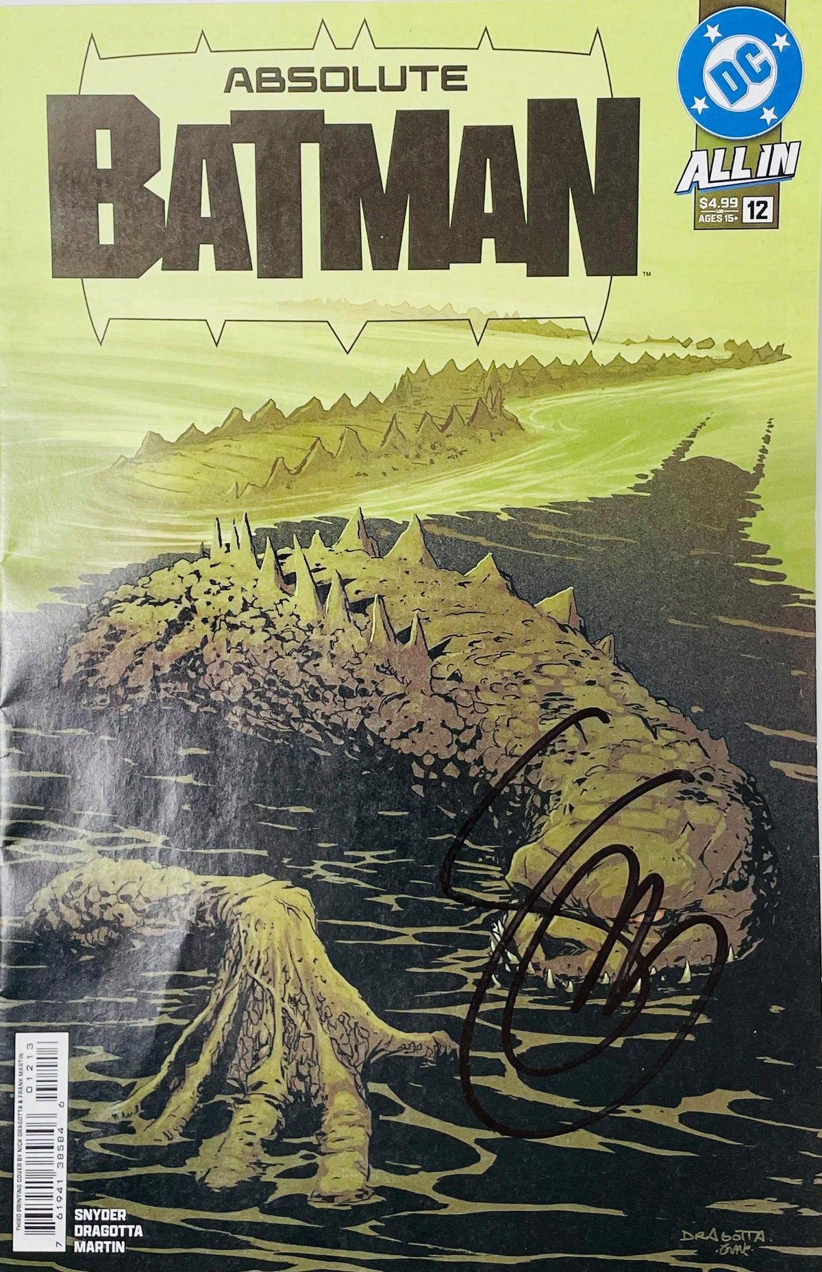 Signed Absolute Batman issue 12 cover by Nick Dragotta showing a giant Killer Croc submerged in murky green water with a signature at the bottom.