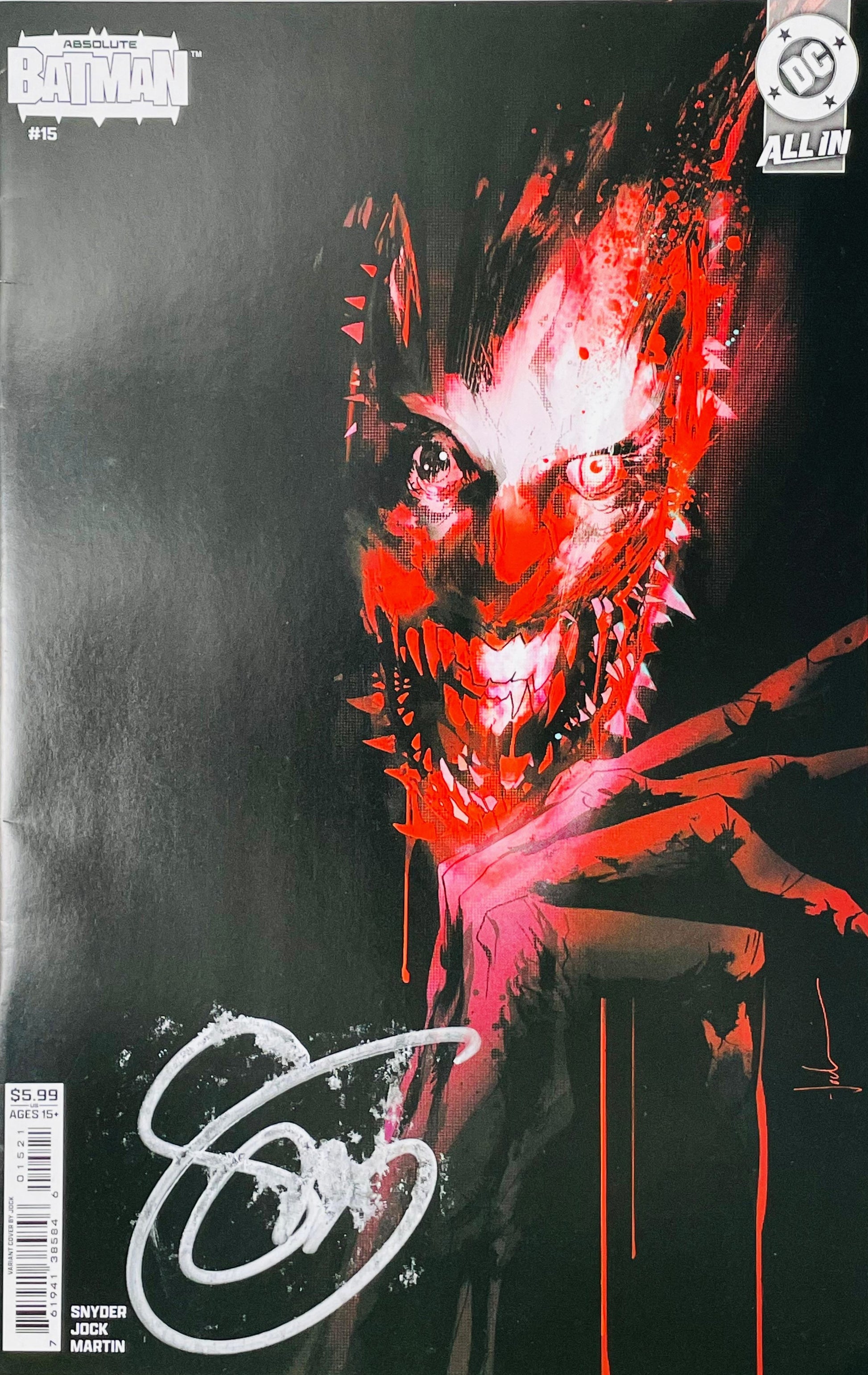 Signed Absolute Batman issue 15 variant cover by Jock featuring a dark black background with a glowing red demonic Joker face and a white signature.