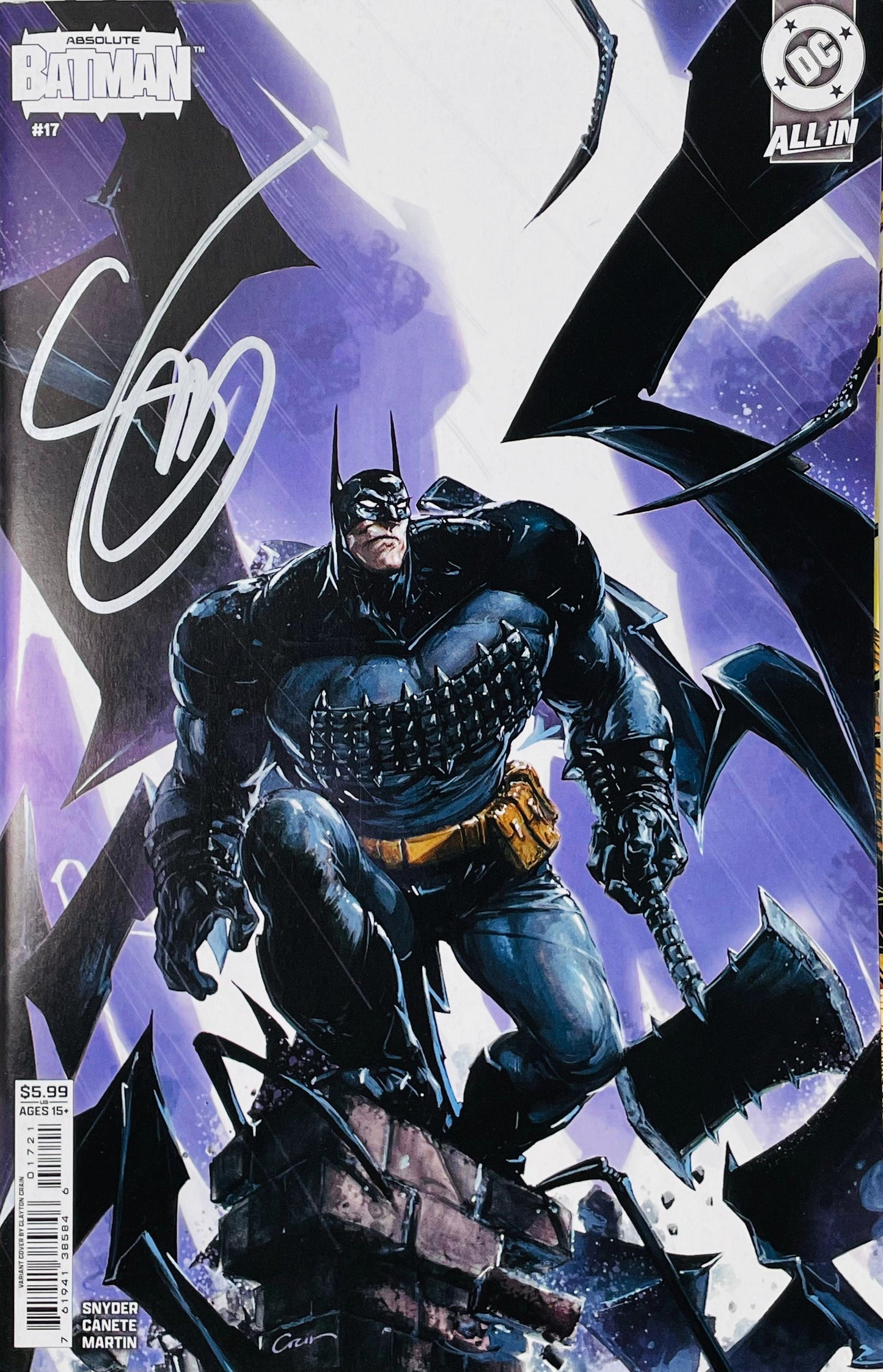 Signed Absolute Batman issue 17 variant cover by Clayton Crain showing a massive armored Batman on a stone ledge in a purple storm with a silver signature.