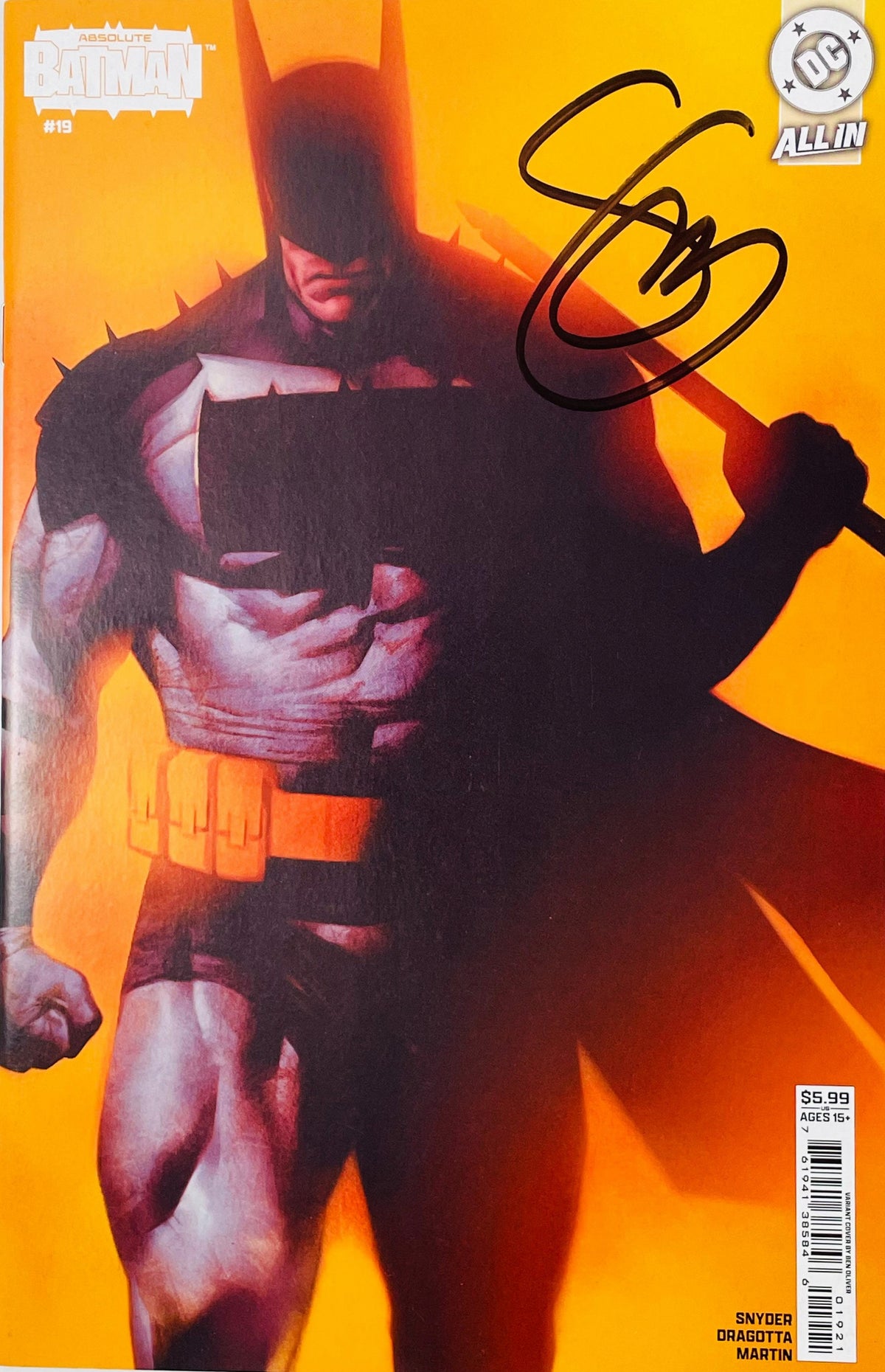 Signed Absolute Batman issue 19 variant cover by Ben Oliver featuring an imposing Batman against a bright orange glow with a black signature.