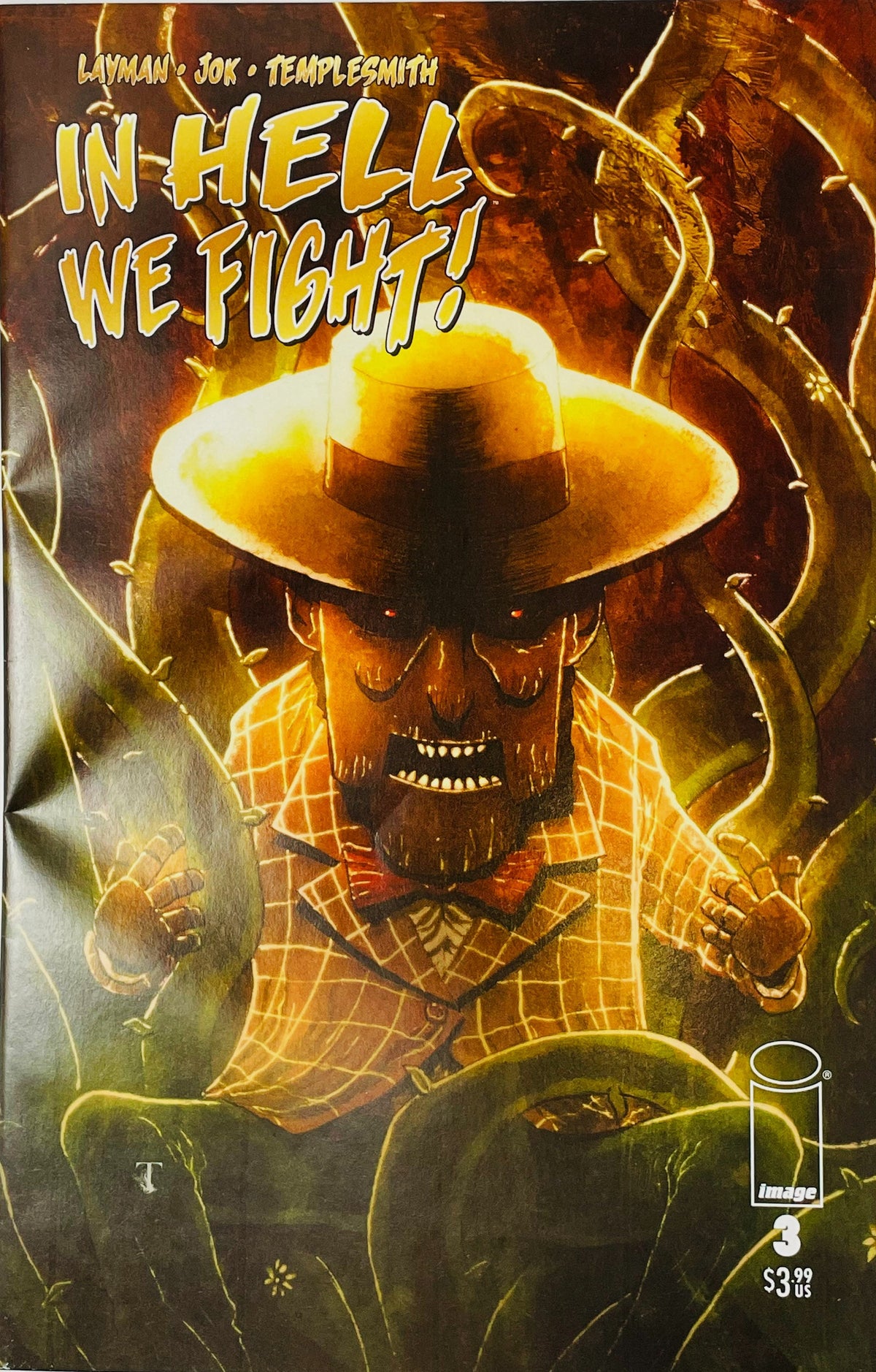 In Hell We Fight issue 3 variant cover by Ben Templesmith featuring a glowing figure with a hat entangled in thorny vines.