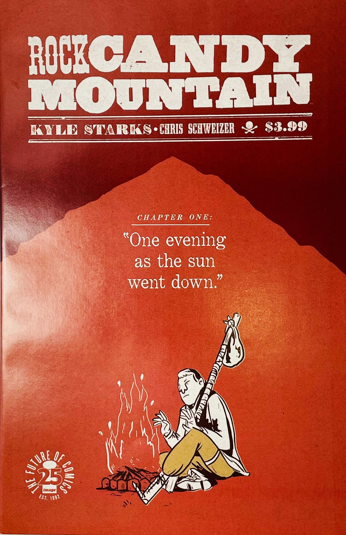 Rock Candy Mountain issue 1 cover featuring a minimalist illustration of a hobo sitting by a campfire against a red mountain backdrop.