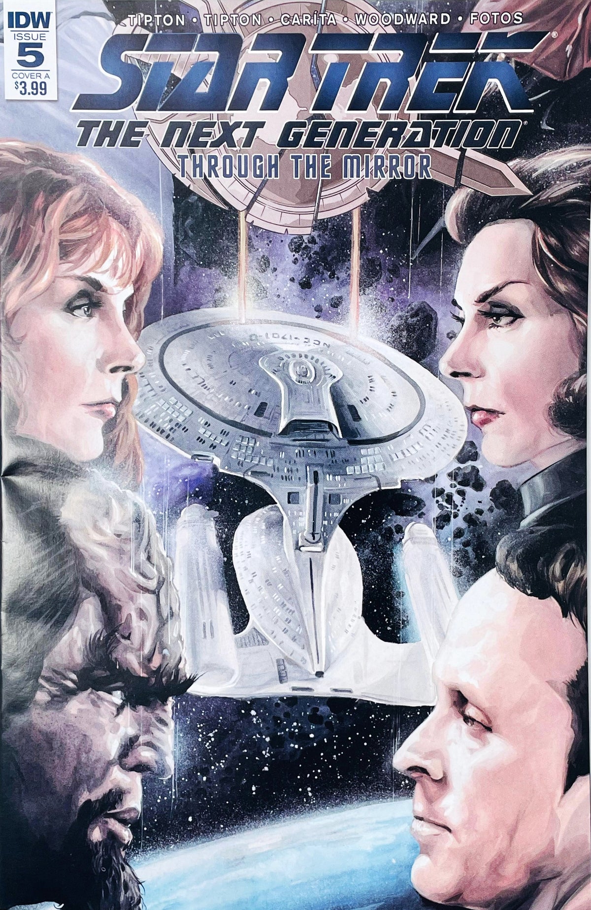 Star Trek The Next Generation Through The Mirror issue 5 comic book featuring J.K. Woodward Cover A painted art of Crusher, Troi, Worf, Data, and the Enterprise.