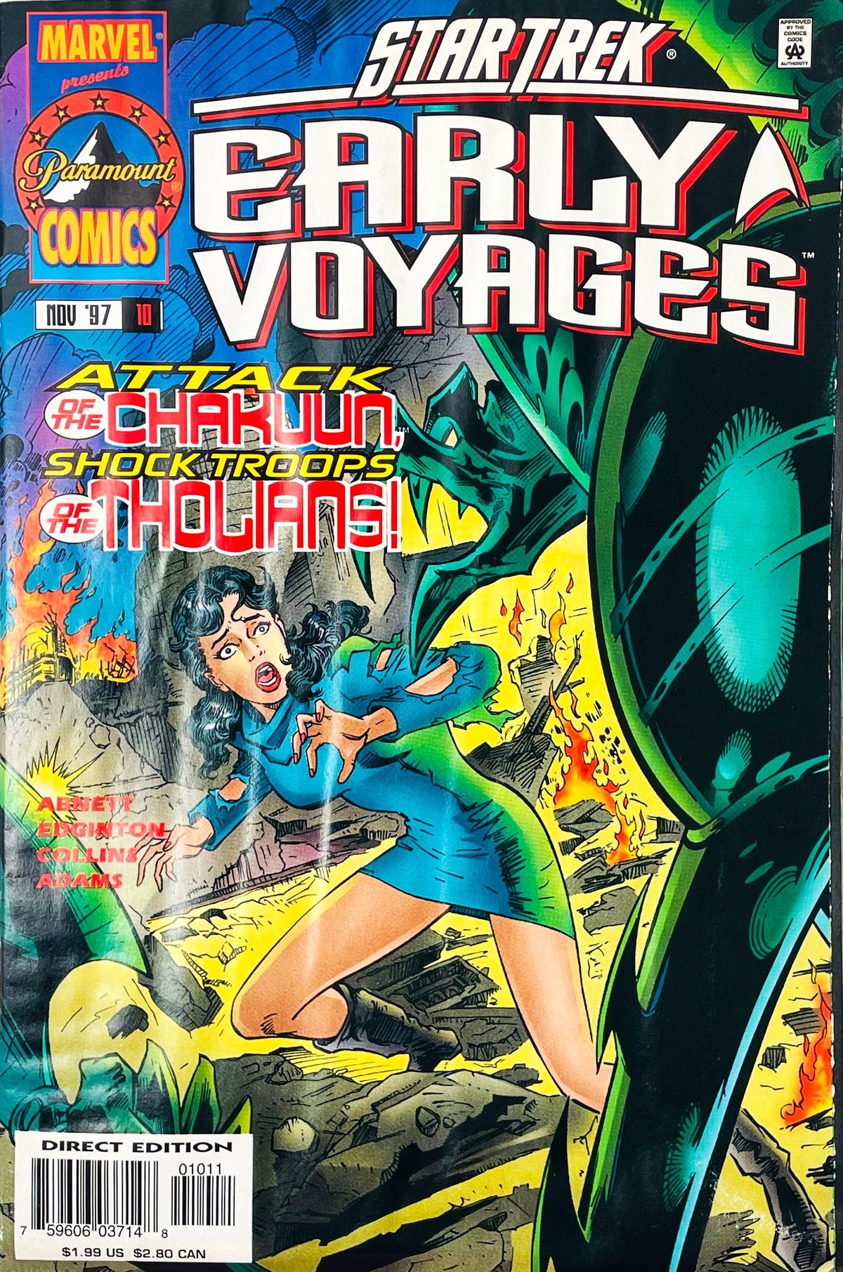 Star Trek Early Voyages issue 10 comic book published by Marvel Paramount Comics featuring Michael Collins cover art of a woman fleeing a Tholian shock trooper.