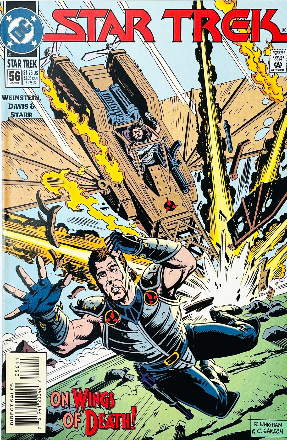 Star Trek volume 2 issue 56 comic book published by DC Comics featuring Rod Whigham and Carlos Garzon cover art of an armored warrior leaping away from an exploding aircraft.