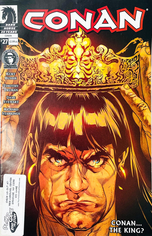 Conan issue 27 comic book published by Dark Horse Comics featuring Tony Harris cover art of a young Conan being crowned king with a Robert E. Howard 100th Anniversary logo.