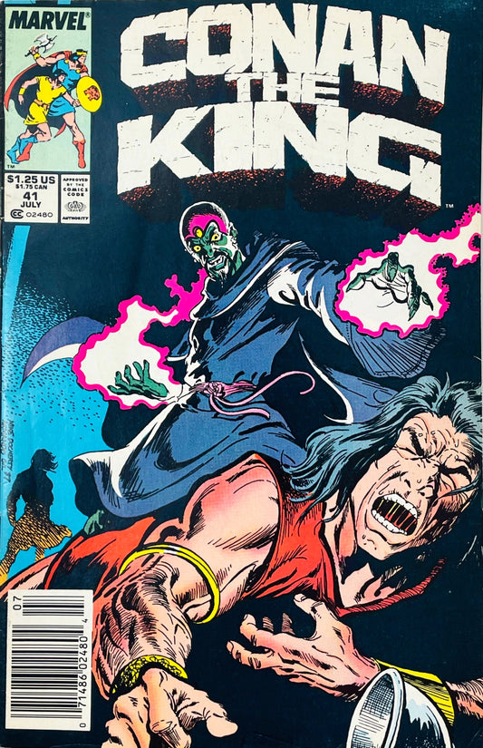 Conan the King issue 41 comic book published by Marvel Comics featuring Mike Docherty cover art of a three-eyed sorcerer blasting magic energy at a struggling King Conan.