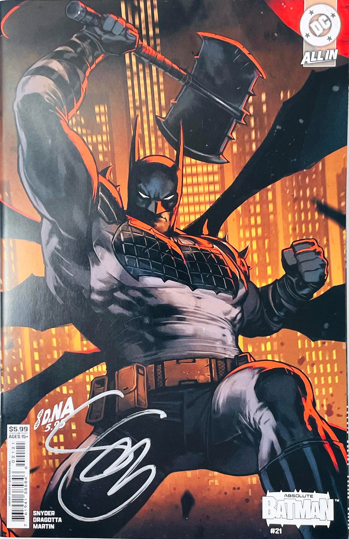 Absolute Batman issue 1 comic book signed by cover artist David Nakayama featuring variant cover art of Absolute Batman wielding a battle axe.