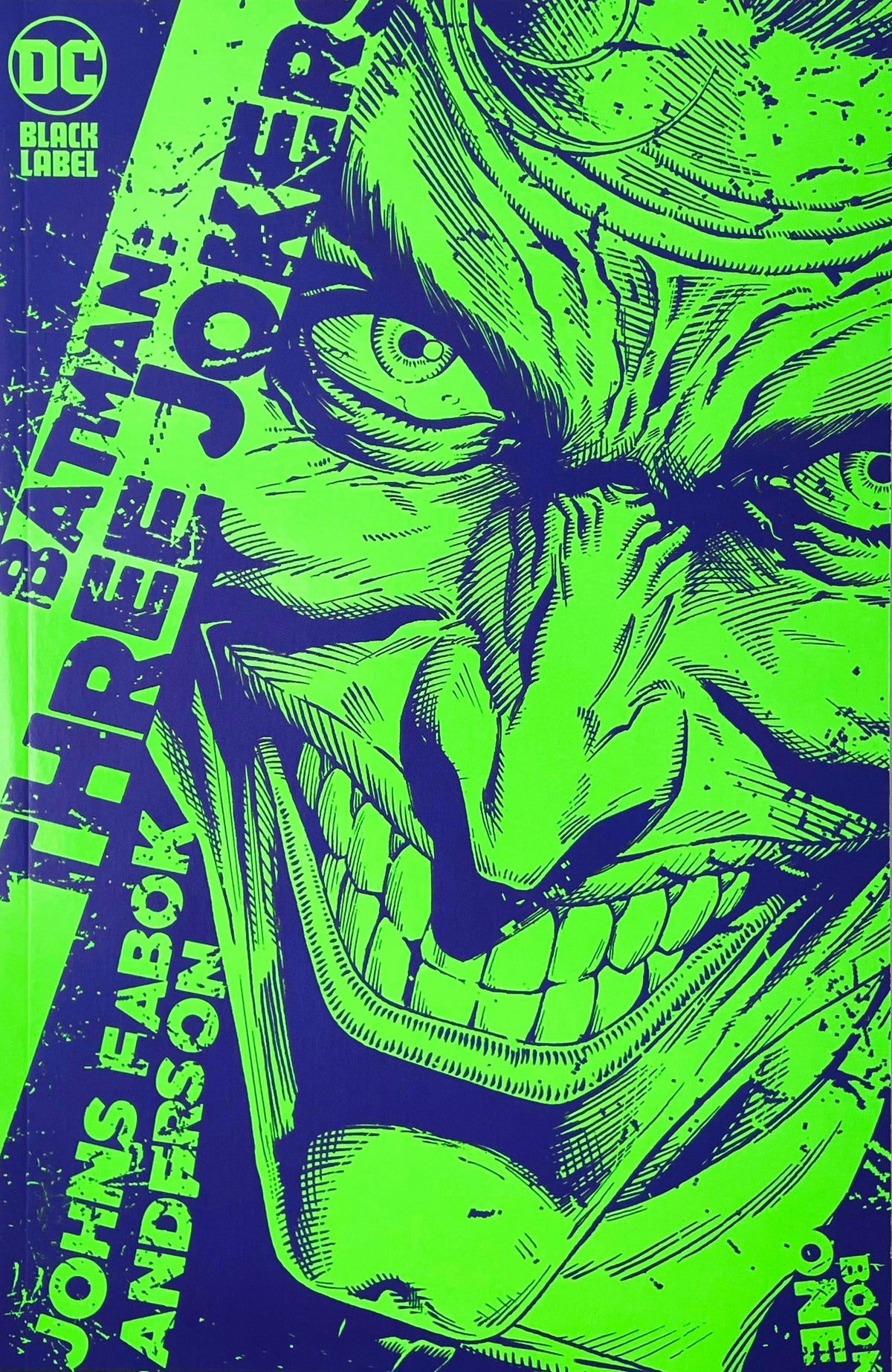 Batman Three Jokers issue 1 comic book published by DC Black Label featuring Jason Fabok premium variant cover art of a neon green and purple close-up illustration of the Joker grinning.