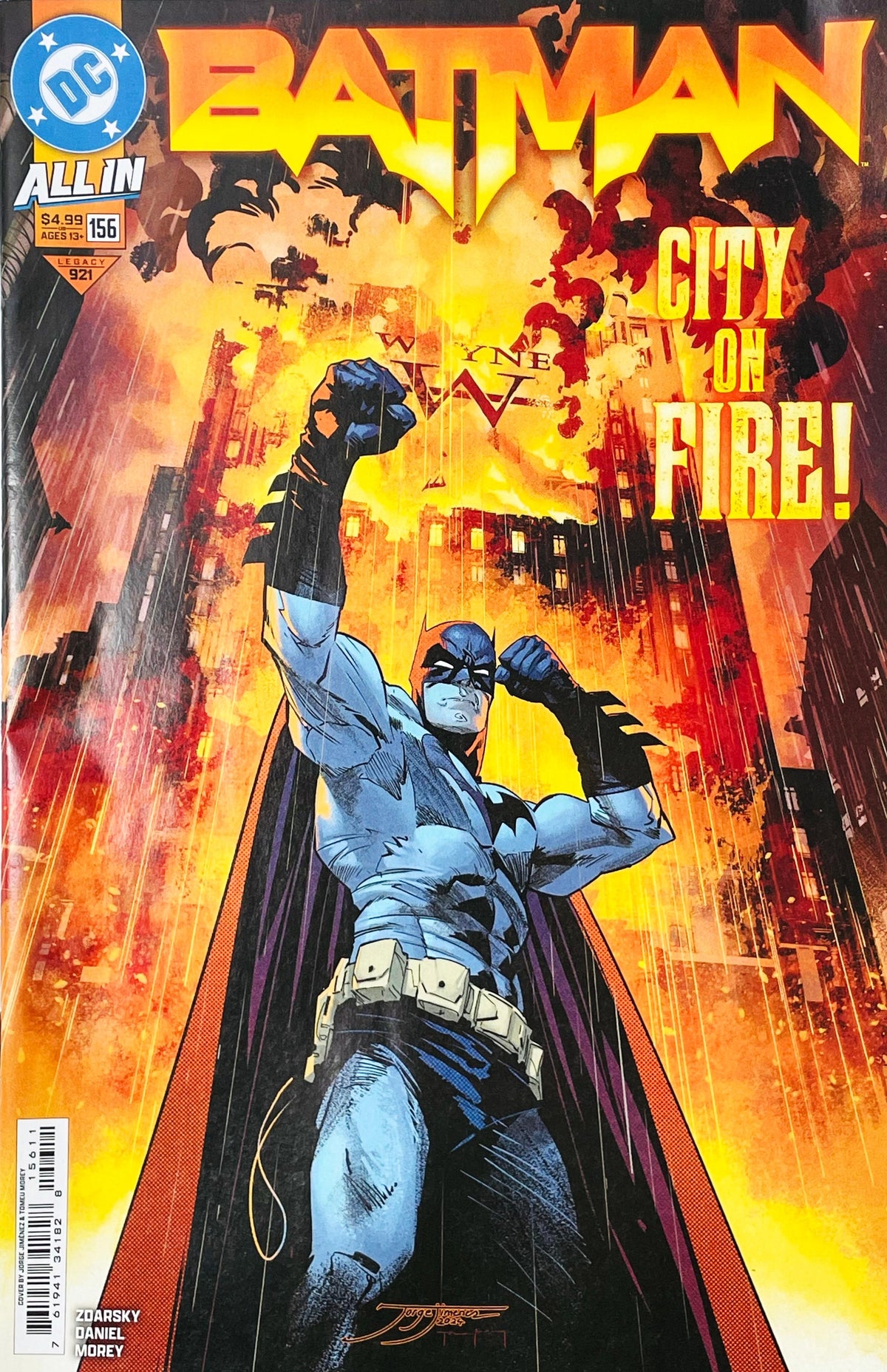 Batman issue 156 comic book published by DC Comics featuring Jorge Jiménez cover art of Batman standing heroically in front of a burning Wayne Tower with text reading City On Fire!