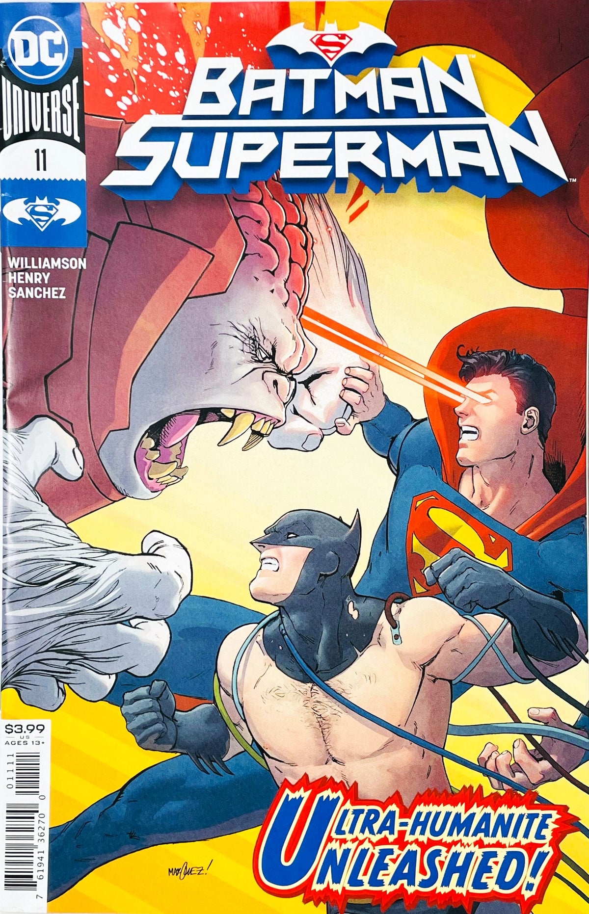 Batman Superman issue 11 comic book published by DC Comics featuring Guillem March cover art of Superman using heat vision against Ultra Humanite with Batman fighting below.