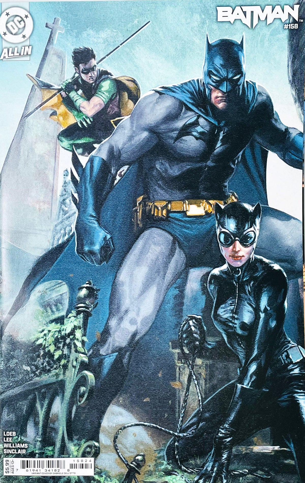 Batman issue 158 comic book published by DC Comics featuring Gabriele Dell'Otto variant cover art of Batman standing guard over Catwoman with Robin in a cemetery.
