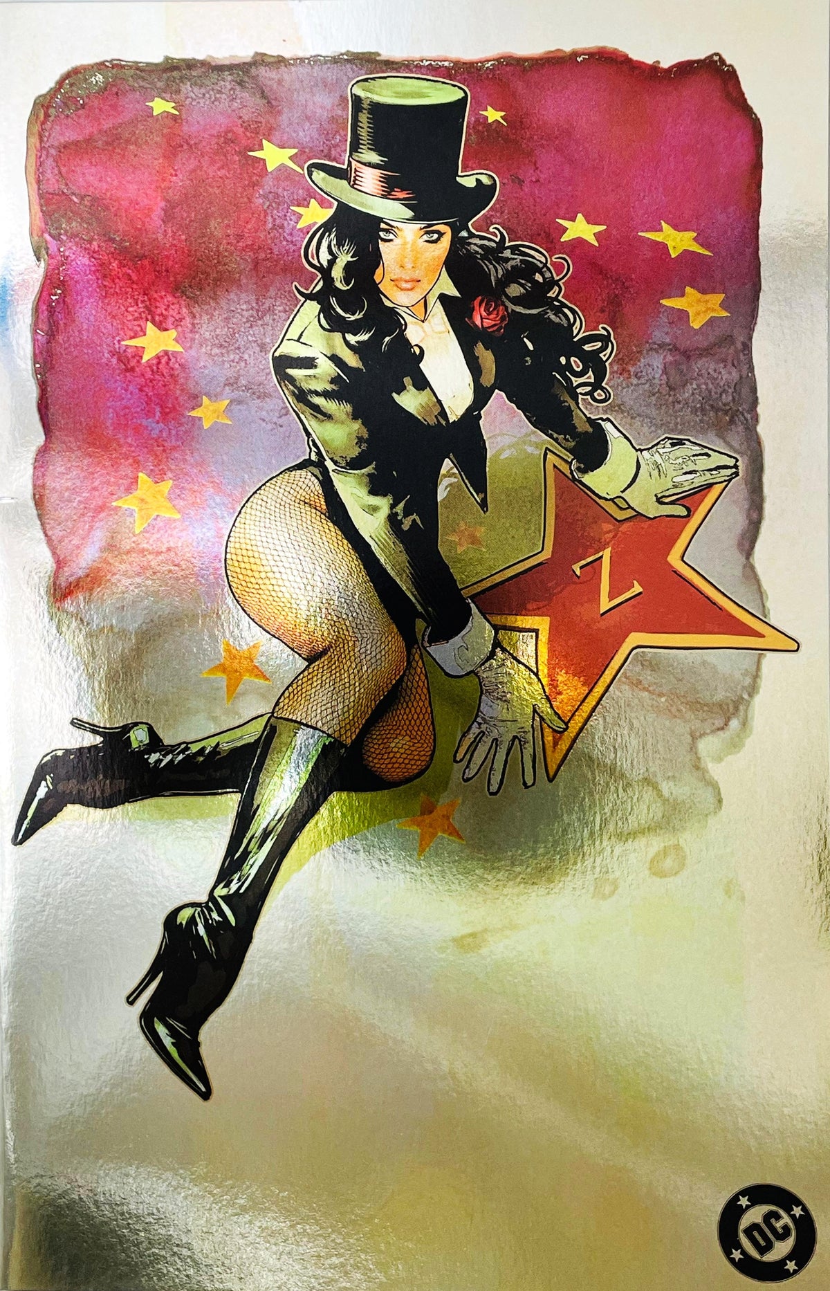 Zatanna issue 1 comic book published by DC Comics featuring Adam Hughes gold foil virgin variant cover art of Zatanna in top hat and fishnets with a gold star.