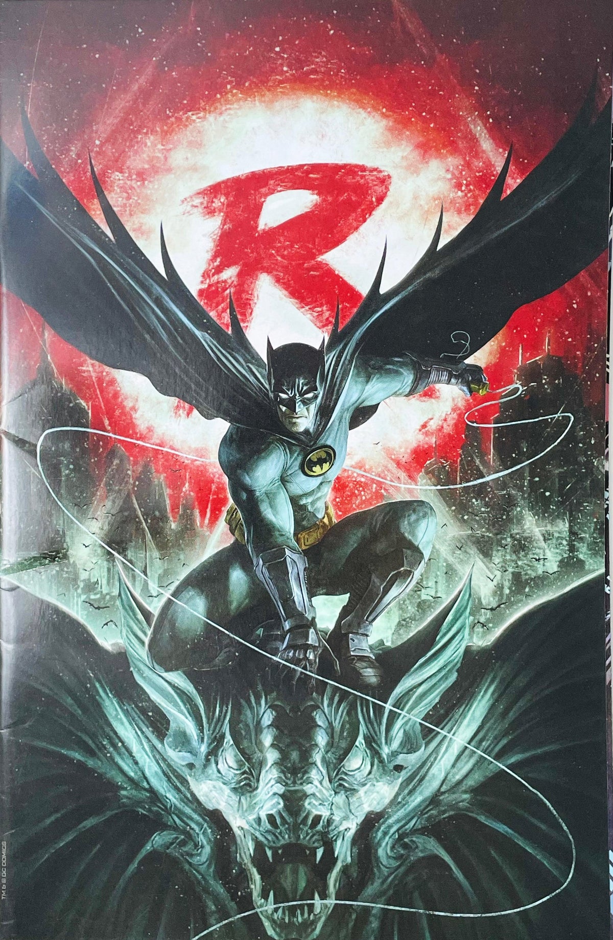 Batman vs Robin issue 1 comic book published by DC Comics featuring Francesco Mattina virgin variant cover art of Batman perched on a gargoyle before a red moon with a Robin logo.