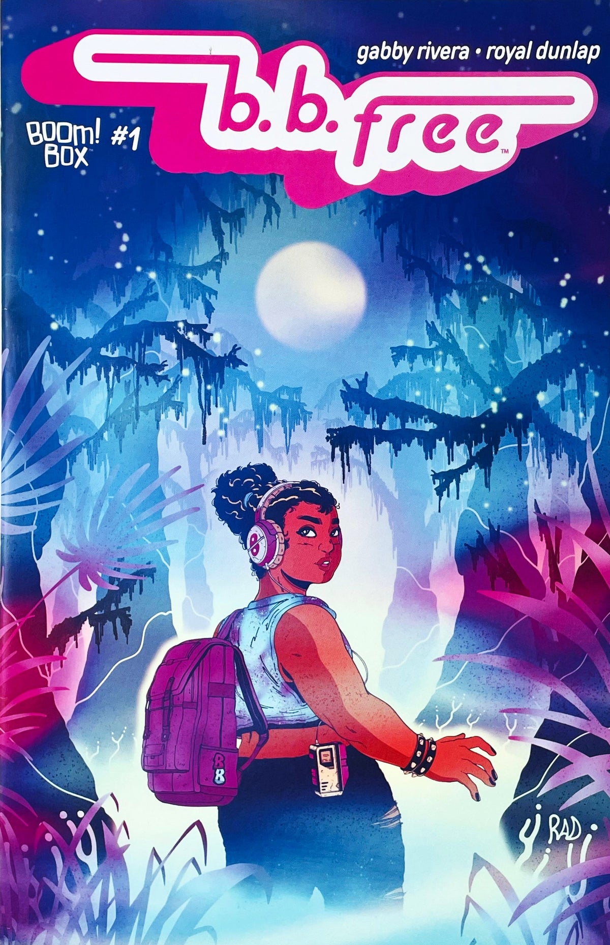 b.b. free issue 1 comic book published by BOOM Box featuring Royal Dunlap cover art of b.b. wearing headphones in a glowing moonlit swamp.