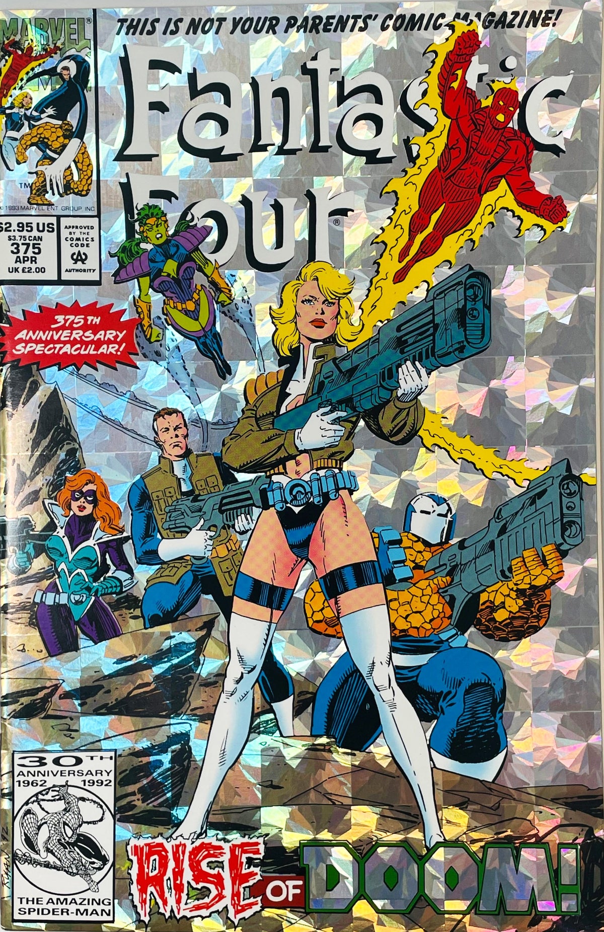 Fantastic Four issue 375 comic book with silver holographic foil cover celebrating the 30th anniversary. Cover features Sue Storm in a leather jacket holding a giant gun with armored Thing, Ant-Man, Lyja, and Human Torch. Spider-Man 30th anniversary logo in corner. Titled "Rise of Doom!".