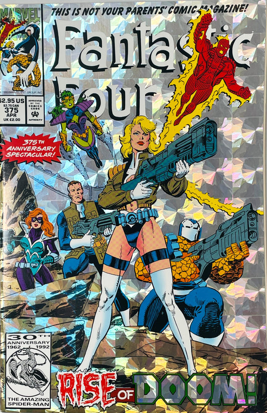 Fantastic Four issue 375 comic book with silver holographic foil cover celebrating the 30th anniversary. Cover features Sue Storm in a leather jacket holding a giant gun with armored Thing, Ant-Man, Lyja, and Human Torch. Spider-Man 30th anniversary logo in corner. Titled "Rise of Doom!".