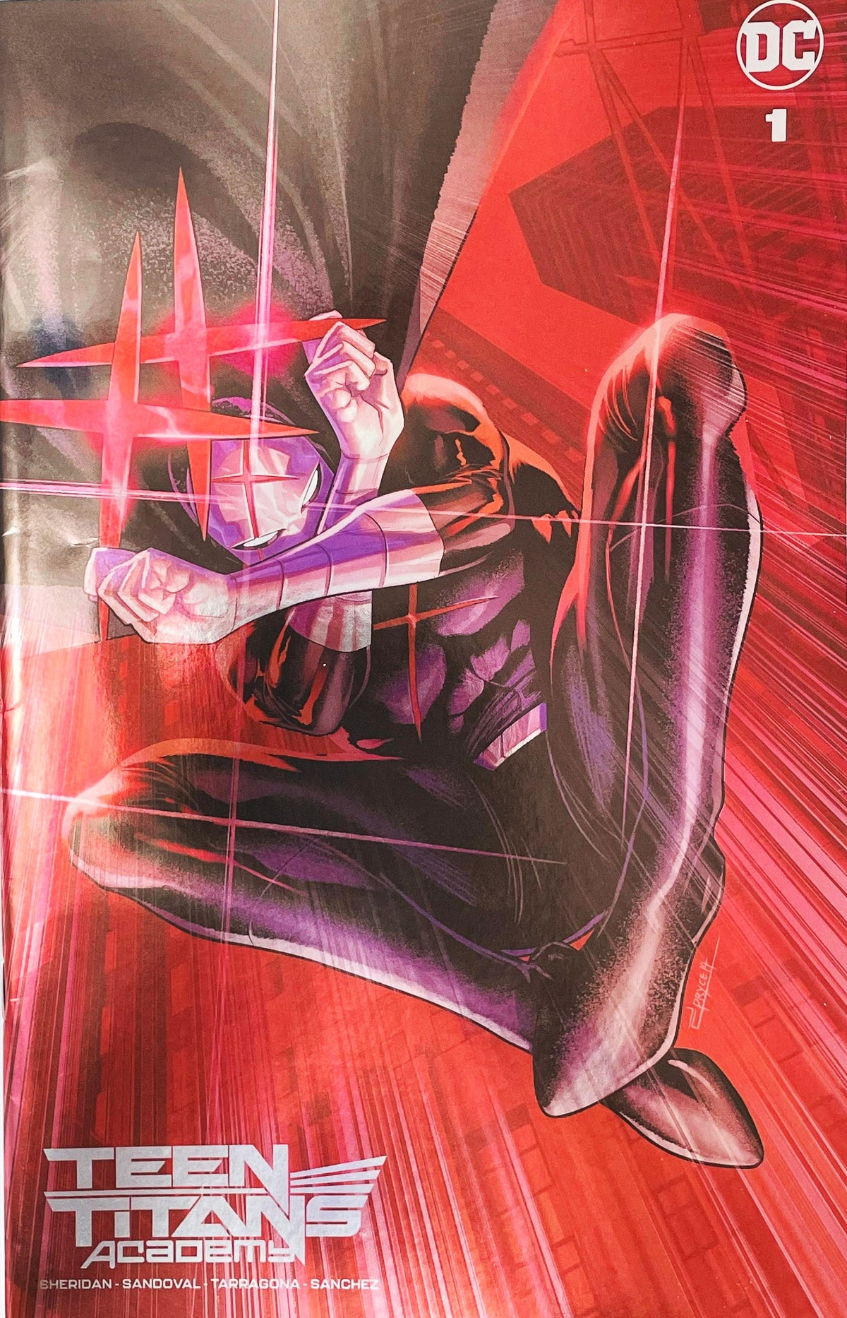 Teen Titans Academy issue 1 comic book published by DC Comics featuring Ejikure cardstock variant cover art of Red X leaping in front of a red city skyline.
