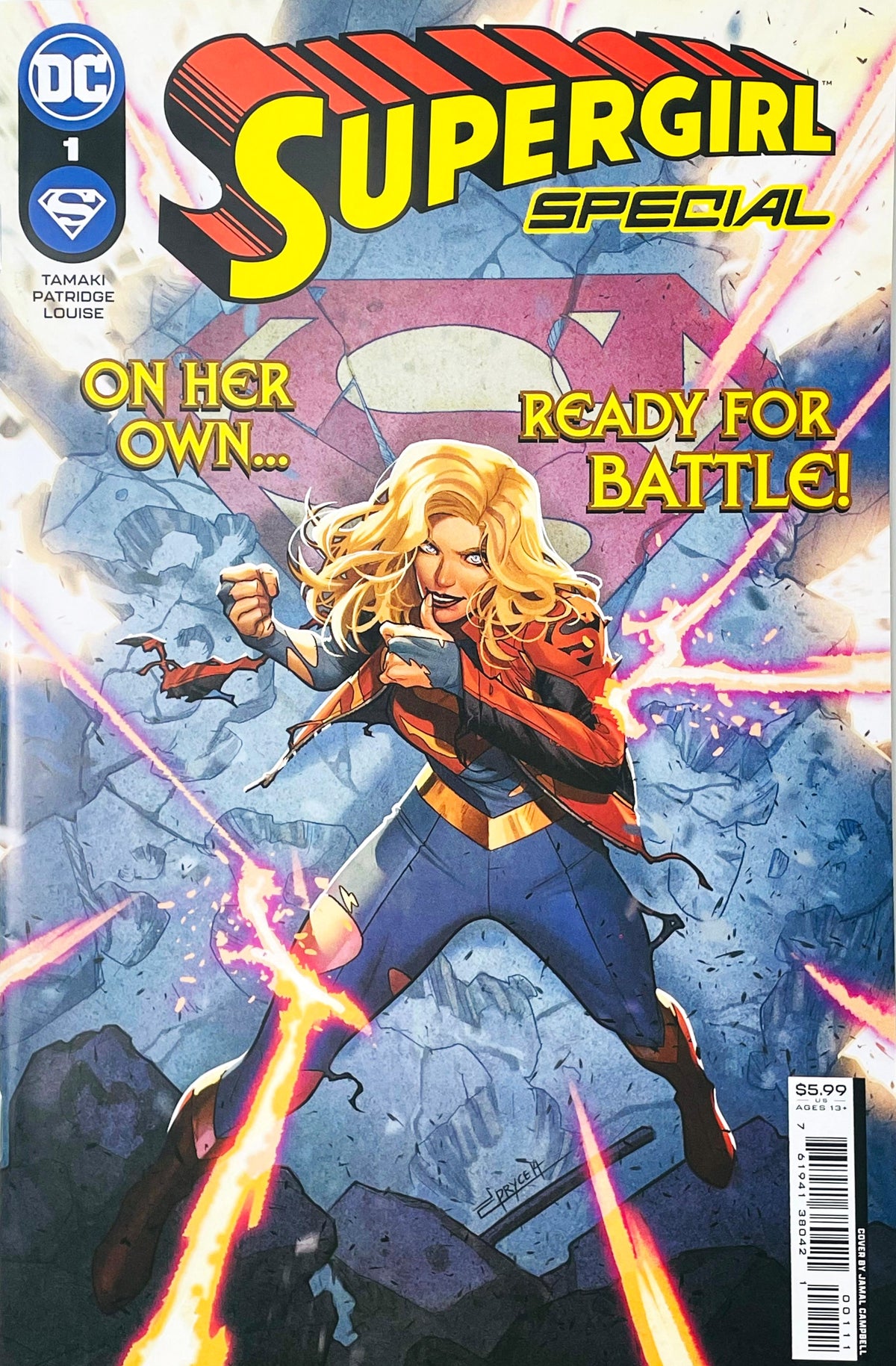 Supergirl Special issue 1 comic book published by DC Comics featuring Jamal Campbell cover art of Kara Zor-El in a battle-damaged suit striking a fight pose amidst laser beams and debris.