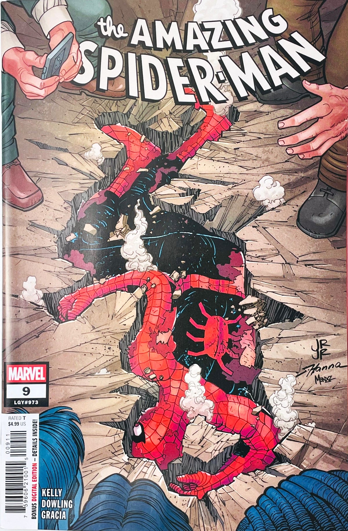 The Amazing Spider-Man issue 9 comic book published by Marvel Comics featuring John Romita Jr. cover art of Spider-Man defeated in a concrete crater.