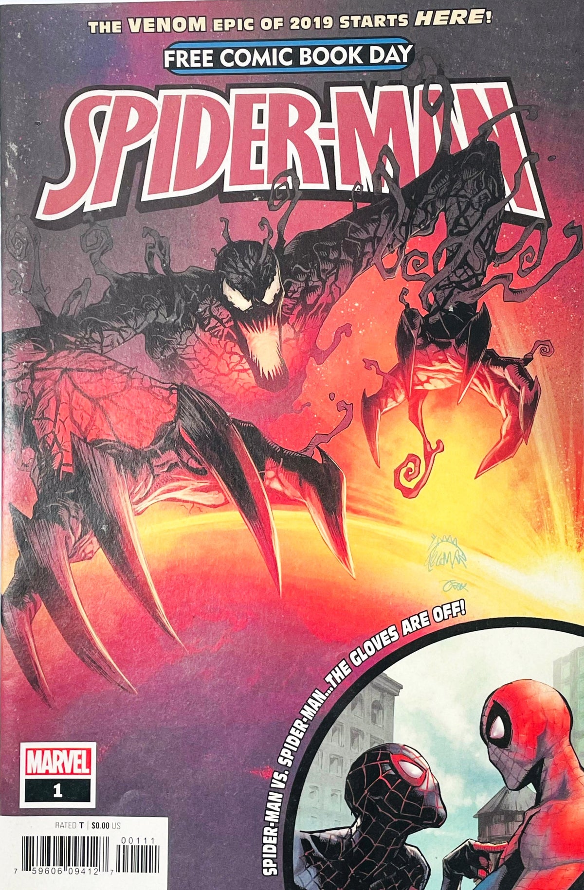 Free Comic Book Day 2019 Spider-Man issue 1 comic book cover by Ryan Stegman featuring Absolute Carnage with sharp claws looming over Peter Parker and Miles Morales.