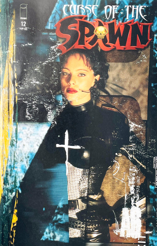 Curse of the Spawn issue 12 comic book published by Image Comics featuring a Brent Ashe photo-montage cover art of assassin Jessica Priest in tactical gear.