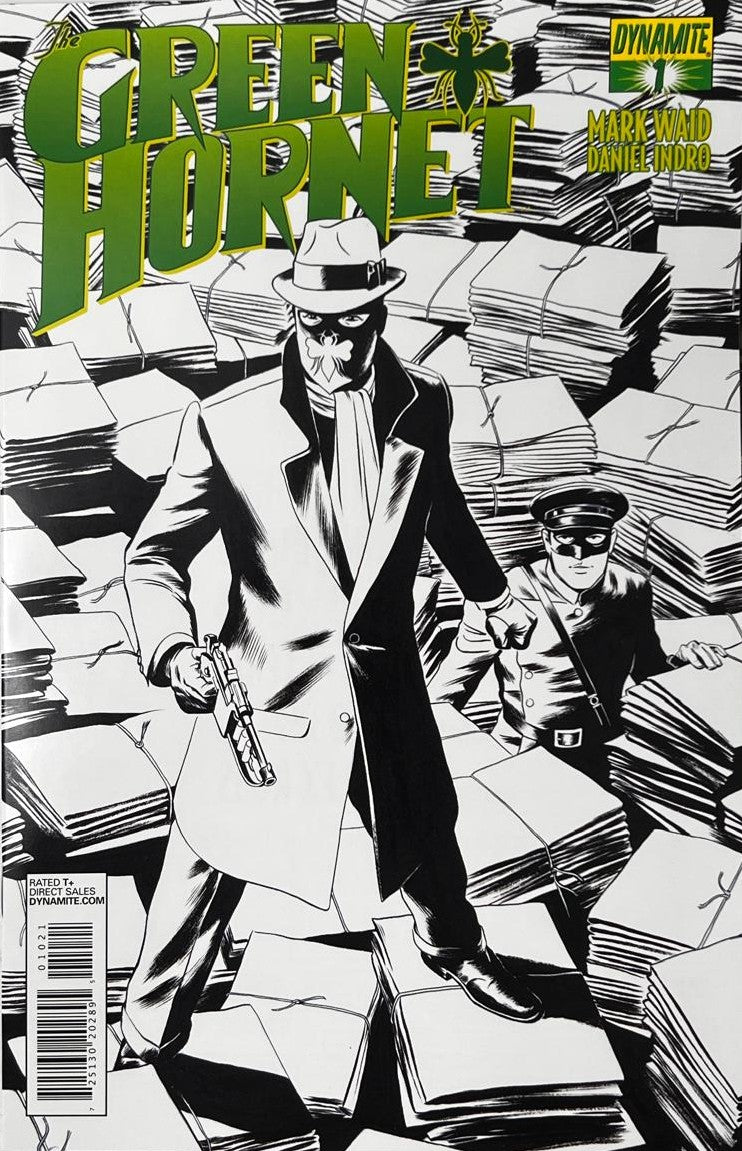 The Green Hornet issue 1 comic book published by Dynamite Entertainment featuring black and white cover art of The Green Hornet holding a weapon alongside Kato standing on stacks of newspapers.