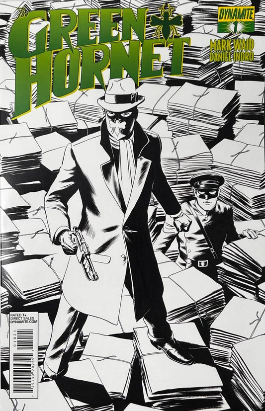 The Green Hornet issue 1 comic book published by Dynamite Entertainment featuring black and white cover art of The Green Hornet holding a weapon alongside Kato standing on stacks of newspapers.