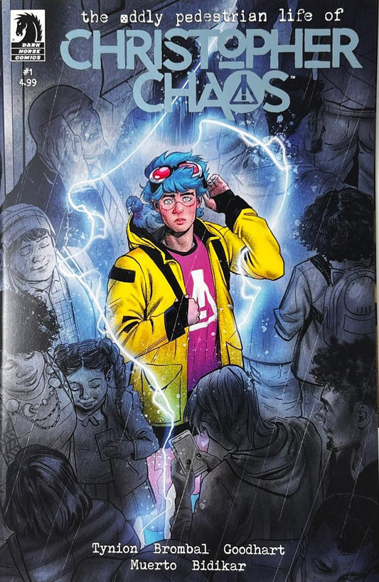 The Oddly Pedestrian Life of Christopher Chaos issue 1 comic book published by Dark Horse Comics featuring cover art of blue haired teenager Christopher Chaos glowing with blue energy in a high school hallway crowd.