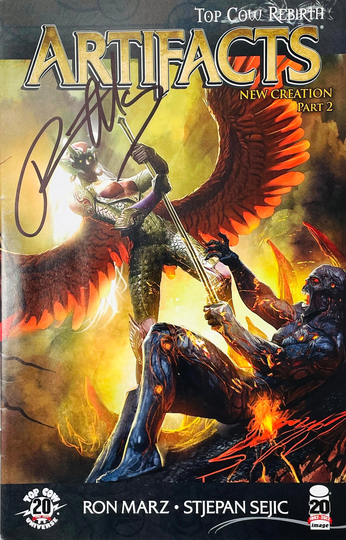 Artifacts issue 15 signed comic book published by Top Cow Image Comics featuring Angelus with feathered wings painted cover art by Stjepan Sejic with black signature.