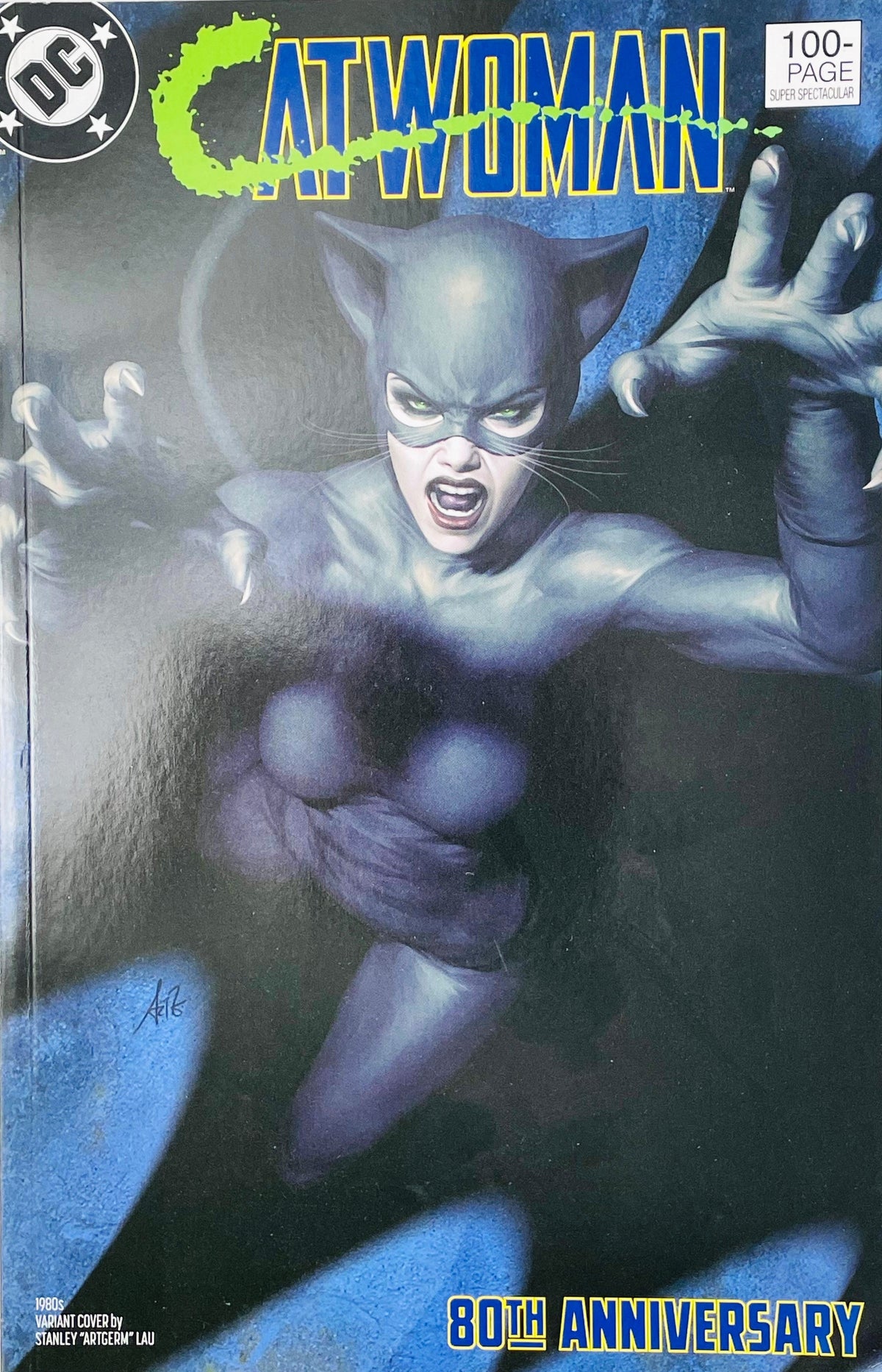 Catwoman 80th Anniversary 100-Page Super Spectacular issue 1 comic book published by DC Comics featuring 1980s blue suit cover art by Stanley Artgerm Lau.