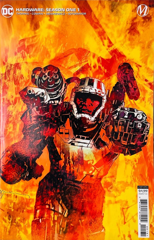 Armored superhero Hardware reaching forward out of intense orange flames on the cover of Hardware Season One 1 comic book by DC Comics and Milestone.