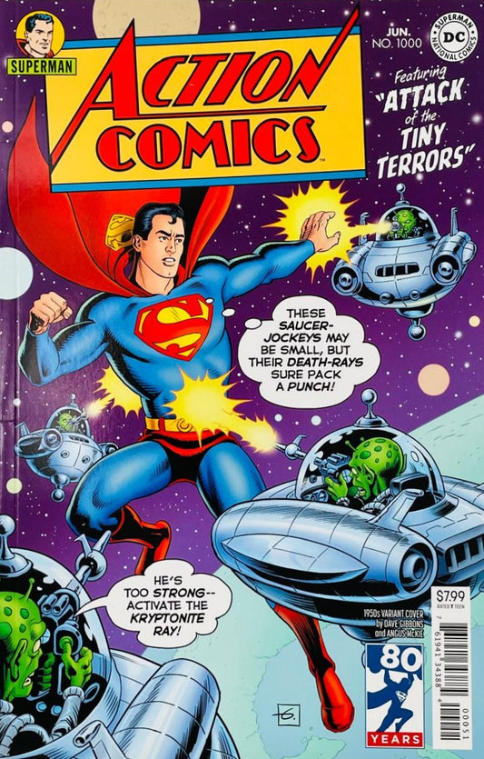 Retro 1950s style cover of Action Comics 1000 by Dave Gibbons showing Superman fighting green aliens in small flying saucers for DC Comics.